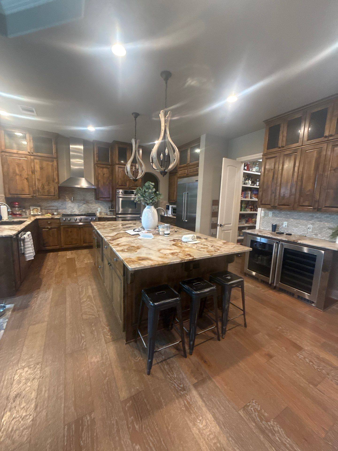 Kitchen island ahead of painting in Austin, TX by Hill Country Painting