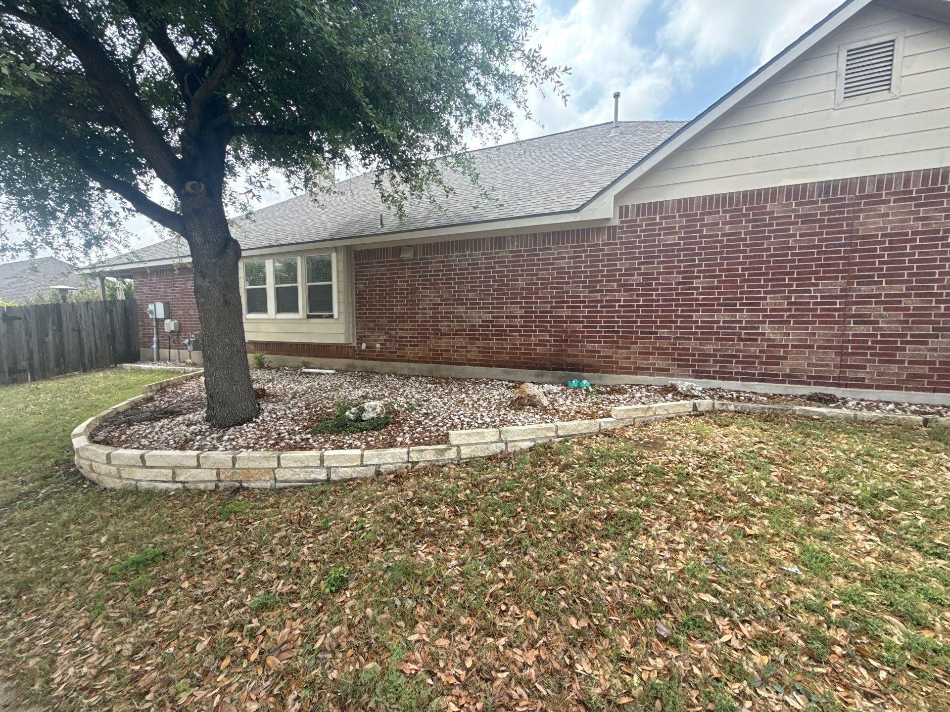 Side yard exterior view ahead of painting in Leander, TX by Hill Country Painting