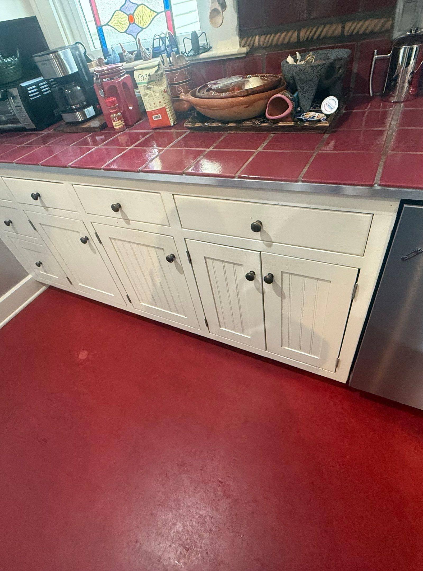 Kitchen cabinet run near appliances ahead of refinishing in Austin, TX by Hill Country Painting