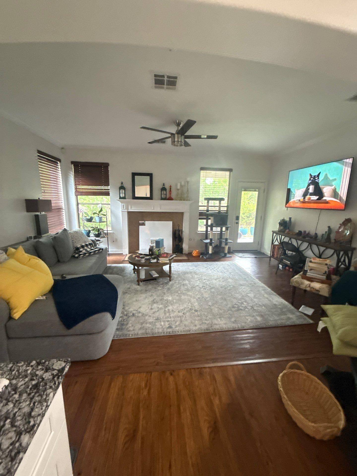 Family room ahead of interior painting in Pflugerville, TX by Hill Country Painting