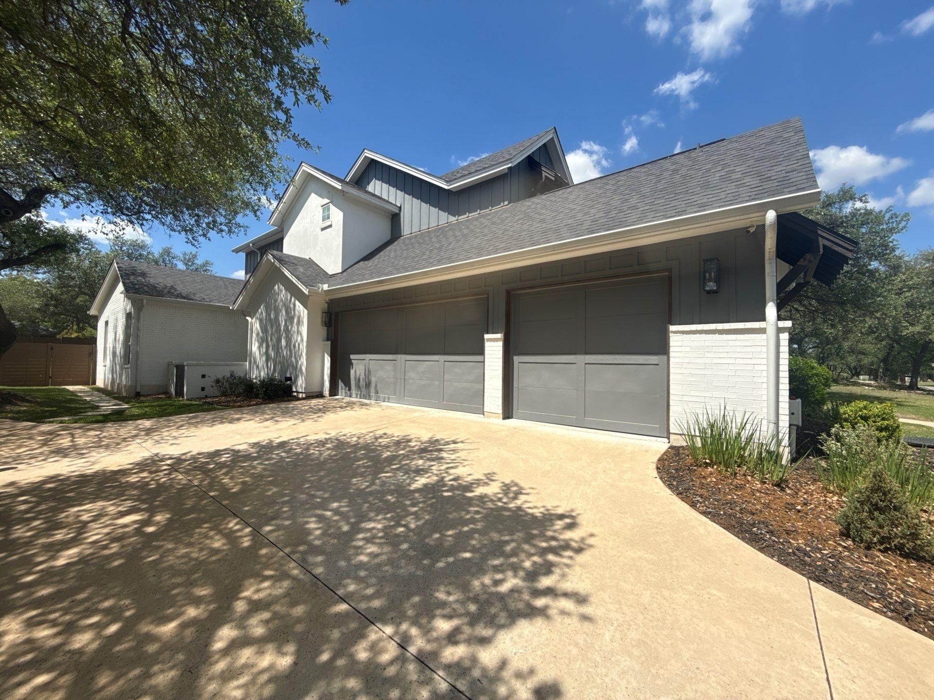 Garage elevation ahead of exterior painting in Lakeway, TX by Hill Country Painting