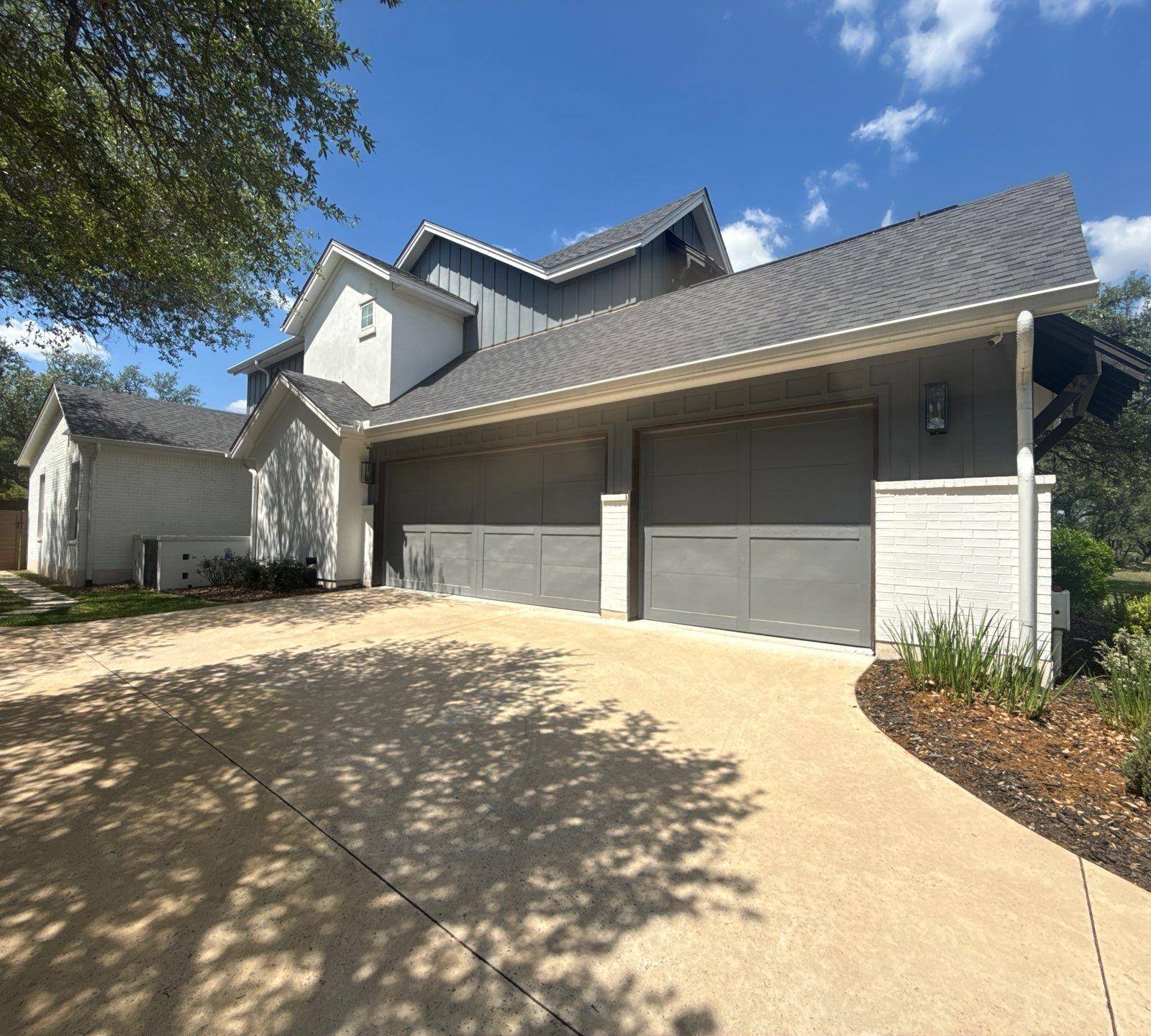 Garage elevation ahead of exterior painting in Lakeway, TX by Hill Country Painting