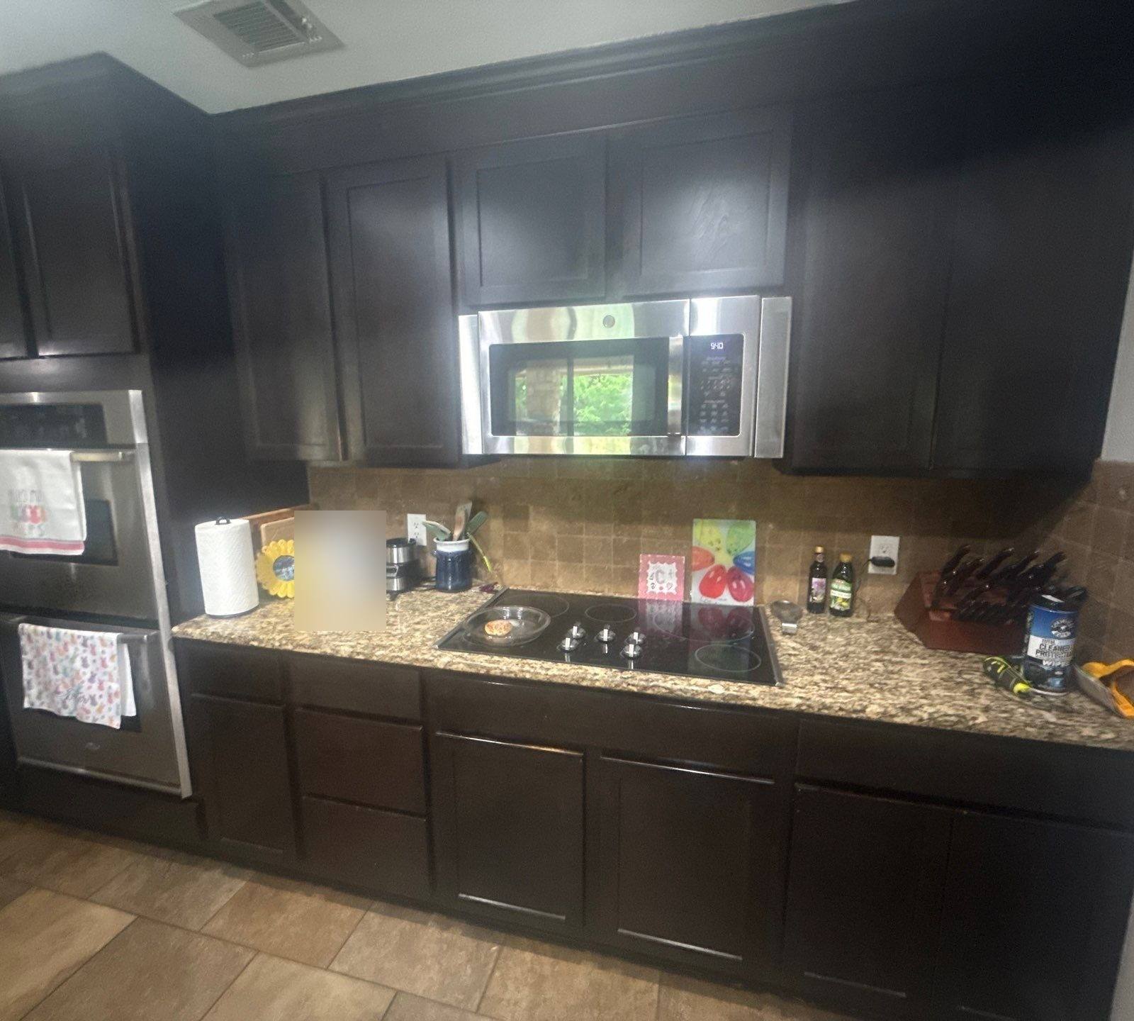Kitchen cabinets ahead of cabinet painting in Round Rock, TX by Hill Country Painting