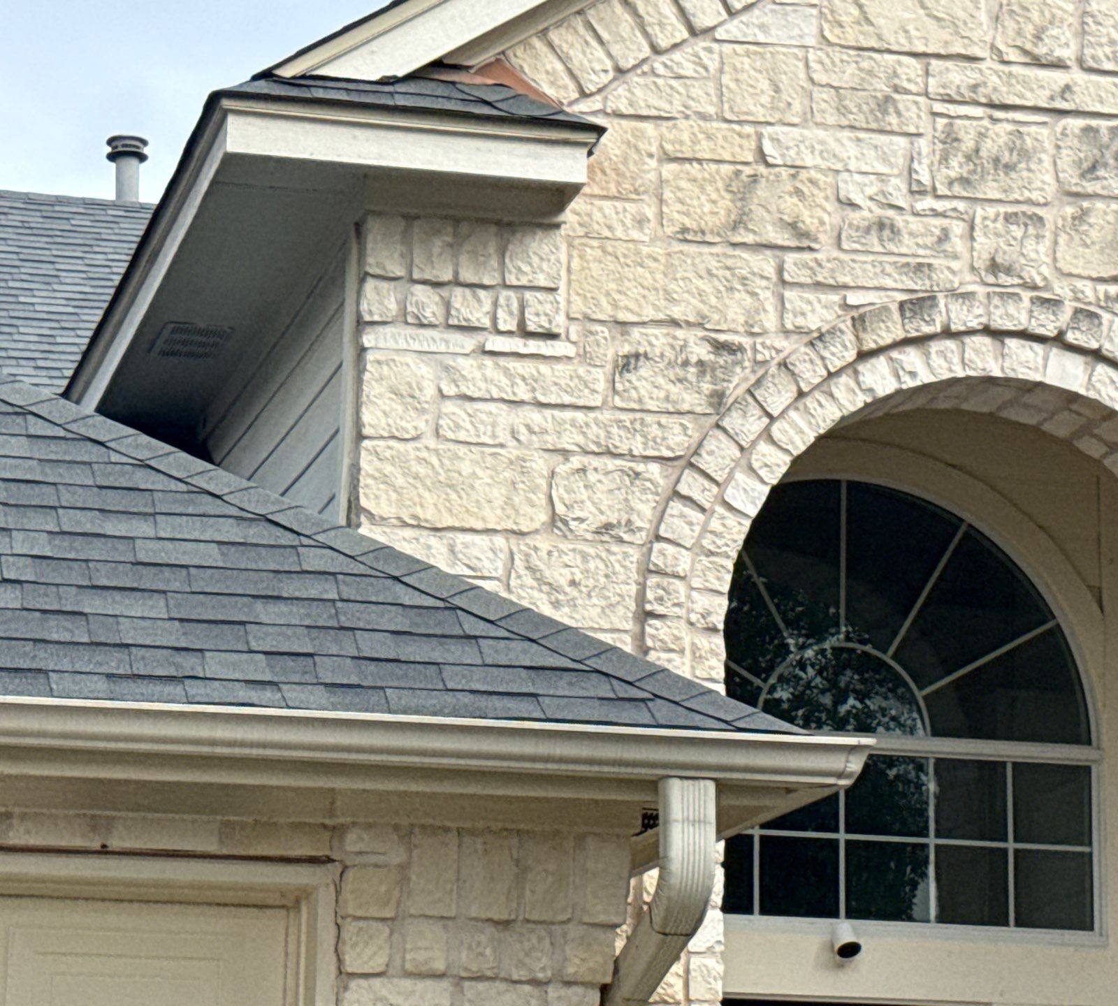 Front entry archway detail ahead of exterior painting in Cedar Park, TX by Hill Country Painting