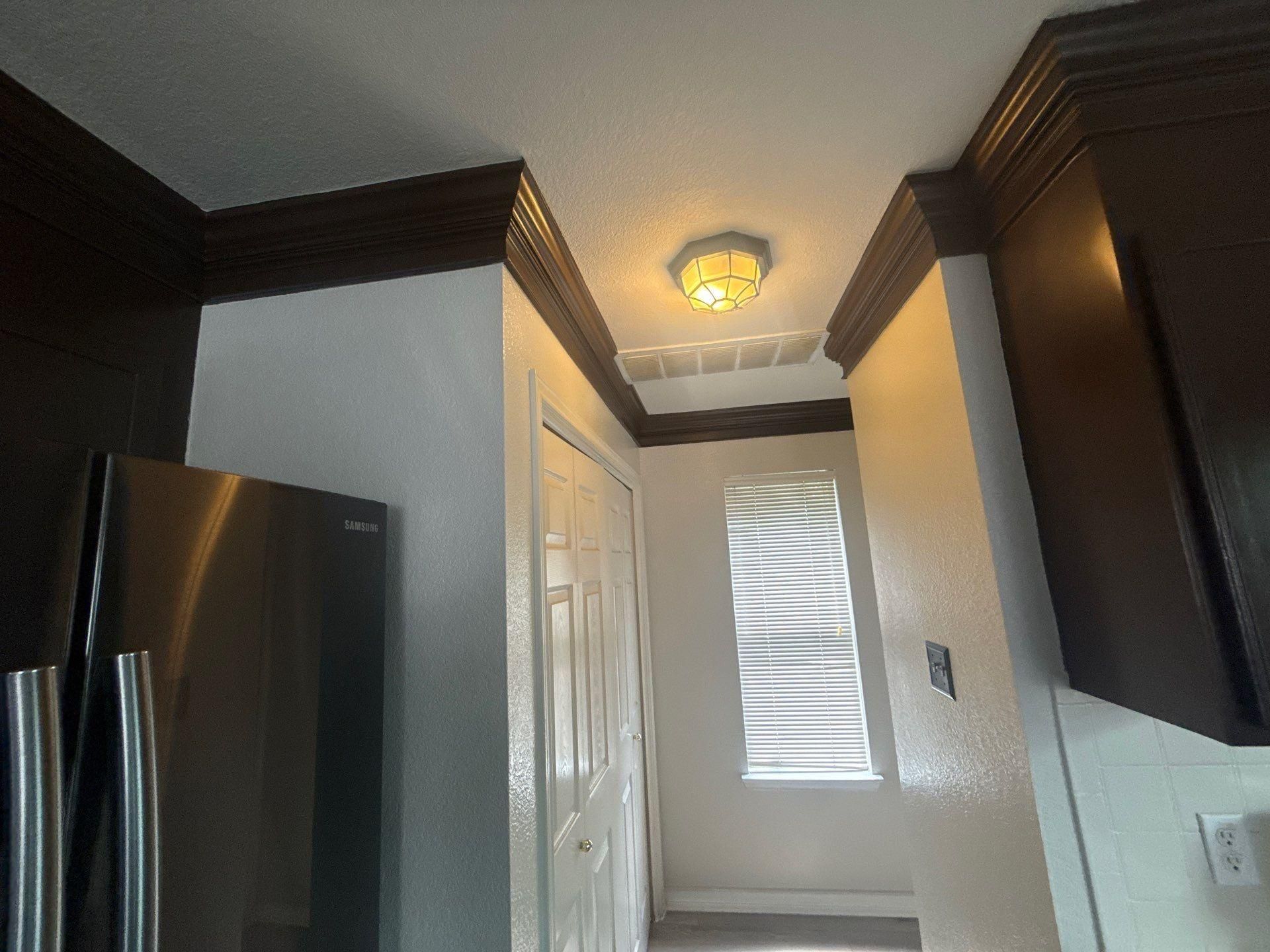 Kitchen cabinets ahead of cabinet painting in Austin, TX by Hill Country Painting