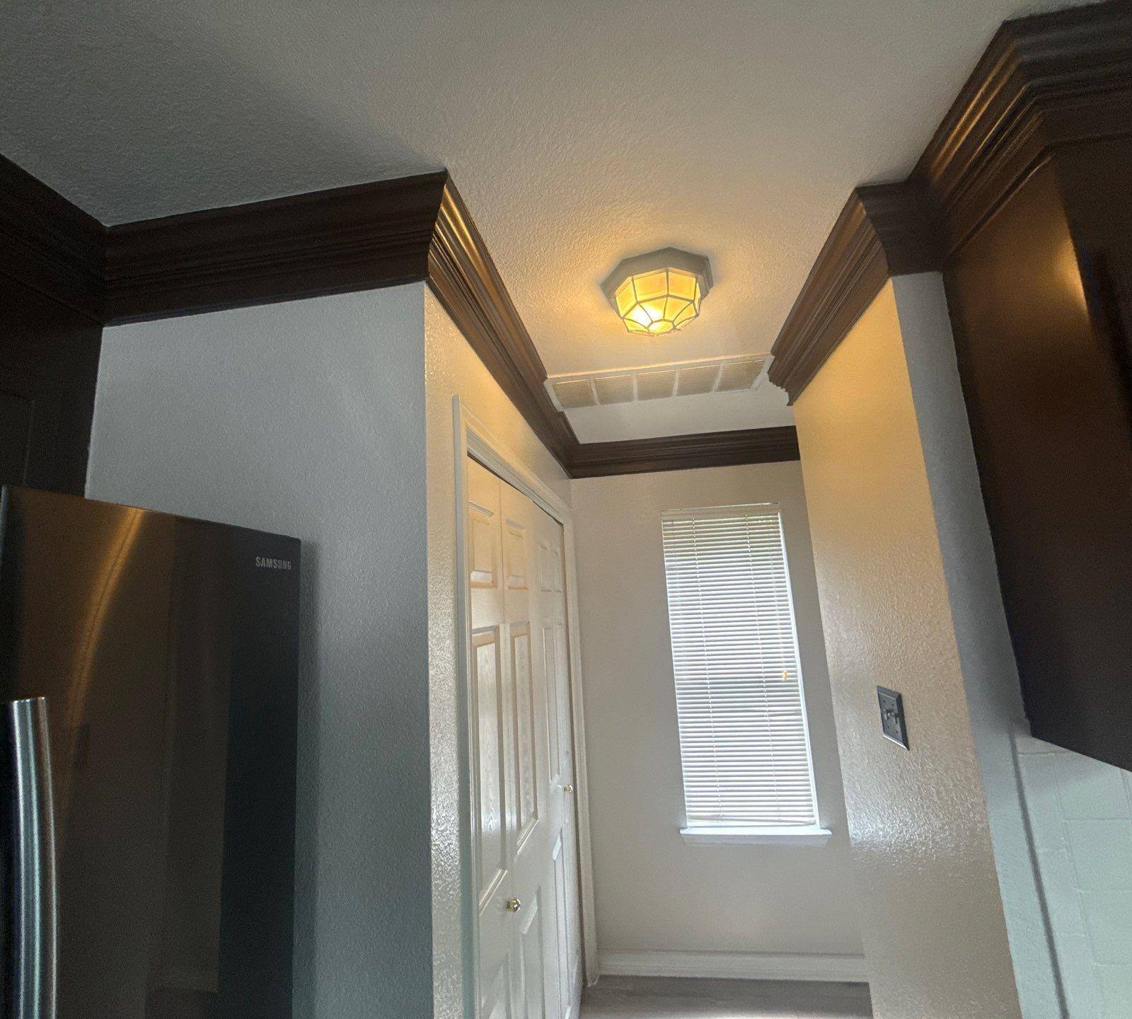 Kitchen cabinets ahead of cabinet painting in Austin, TX by Hill Country Painting