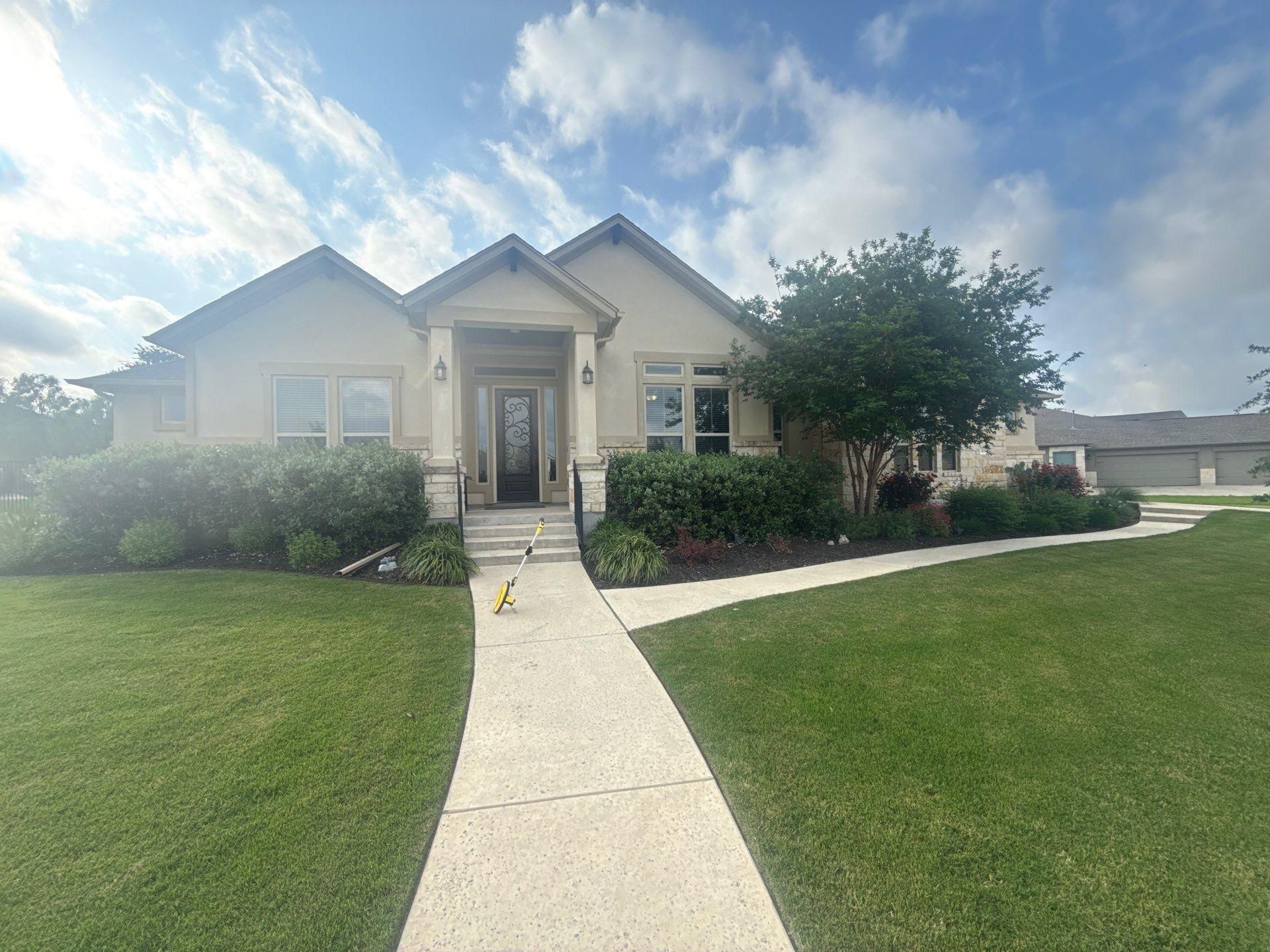 Front elevation ahead of exterior painting in Liberty Hill, TX by Hill Country Painting