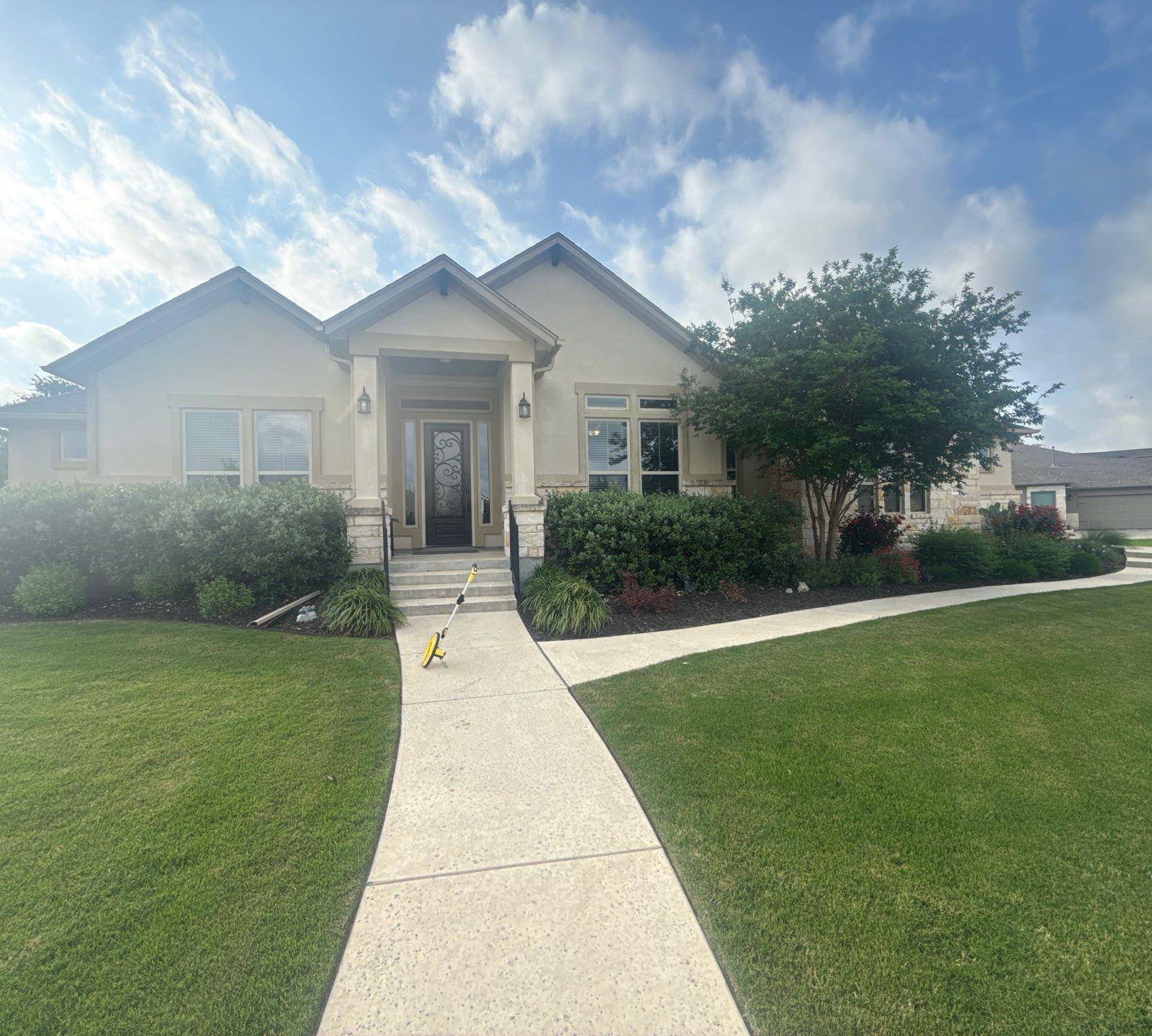 Front elevation ahead of exterior painting in Liberty Hill, TX by Hill Country Painting