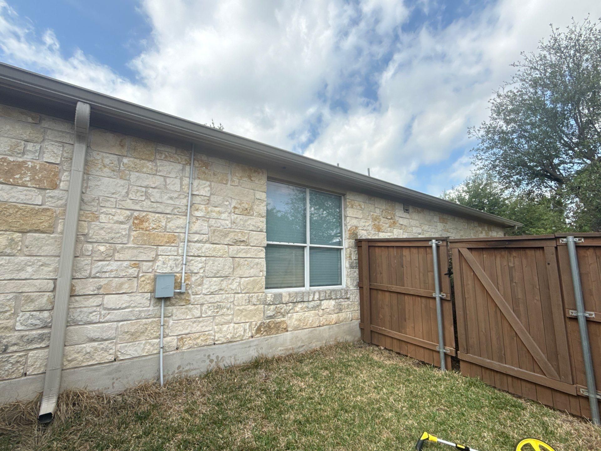 Side yard elevation ahead of exterior painting in Cedar Park, TX by Hill Country Painting