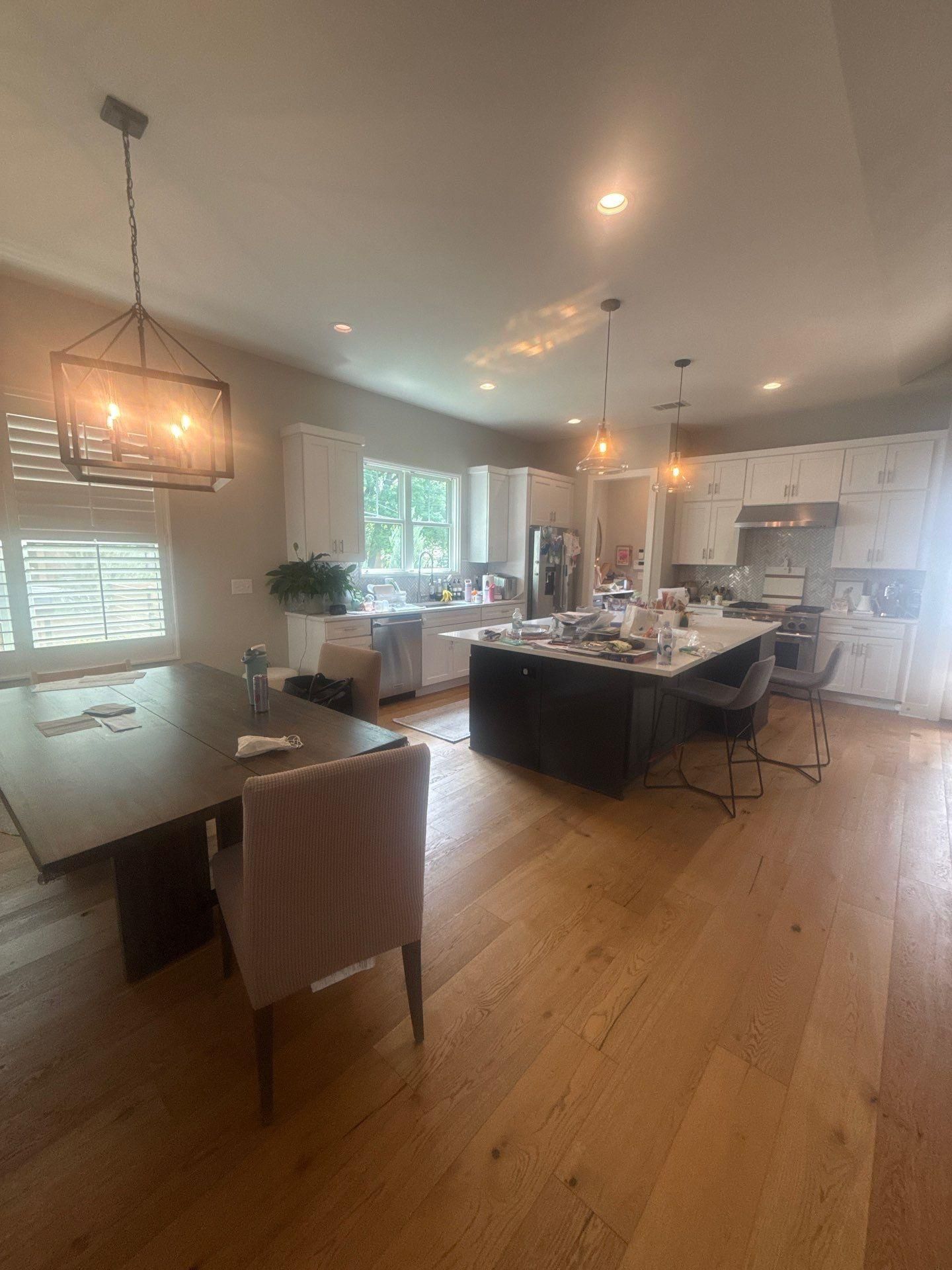 Kitchen and dining area ahead of interior painting in Austin, TX by Hill Country Painting