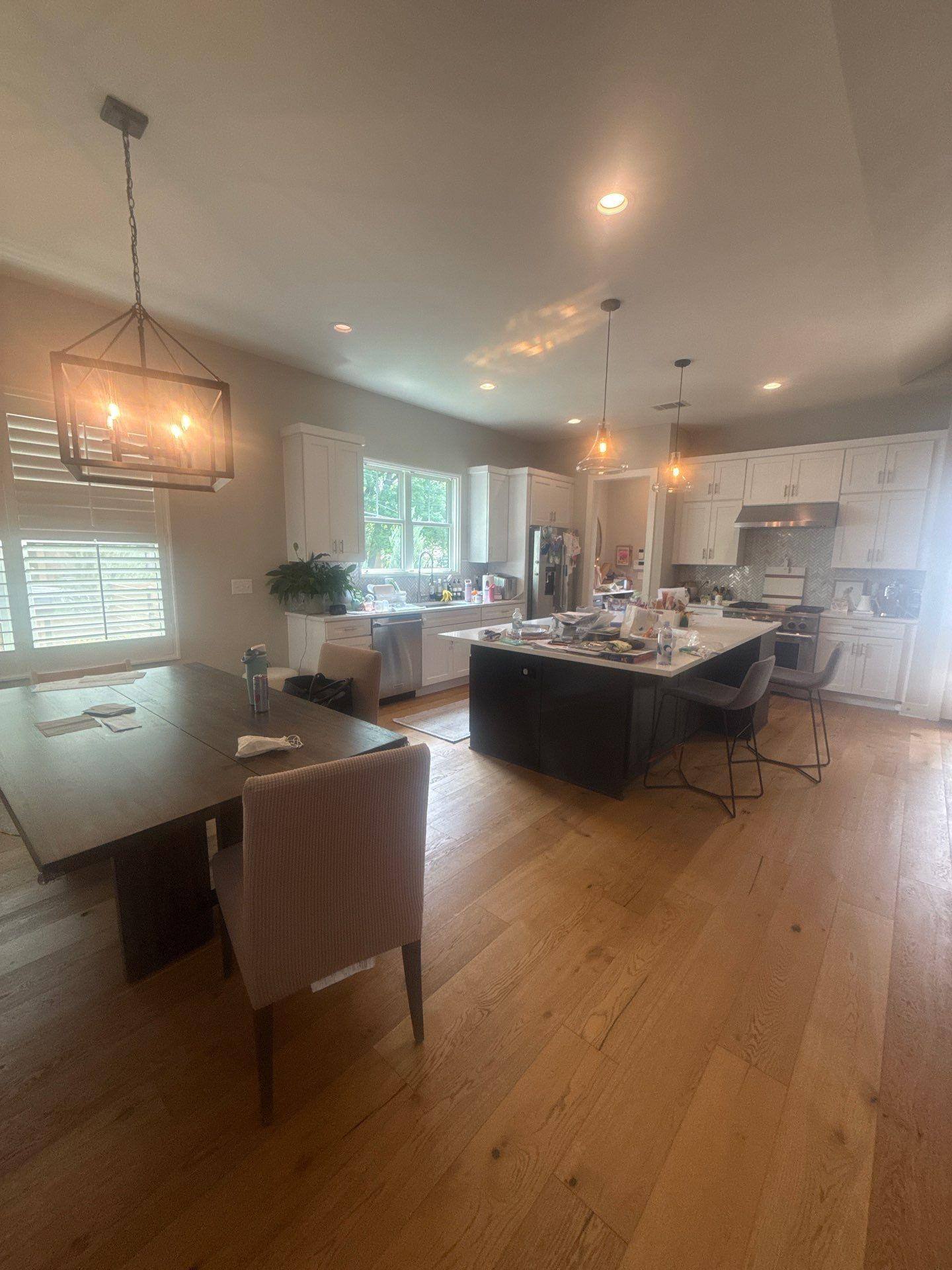 Kitchen and dining area ahead of interior painting in Austin, TX by Hill Country Painting