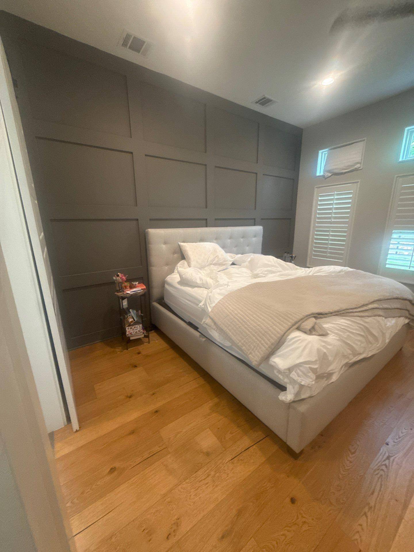 Bedroom with accent wall ahead of interior painting in Austin, TX by Hill Country Painting