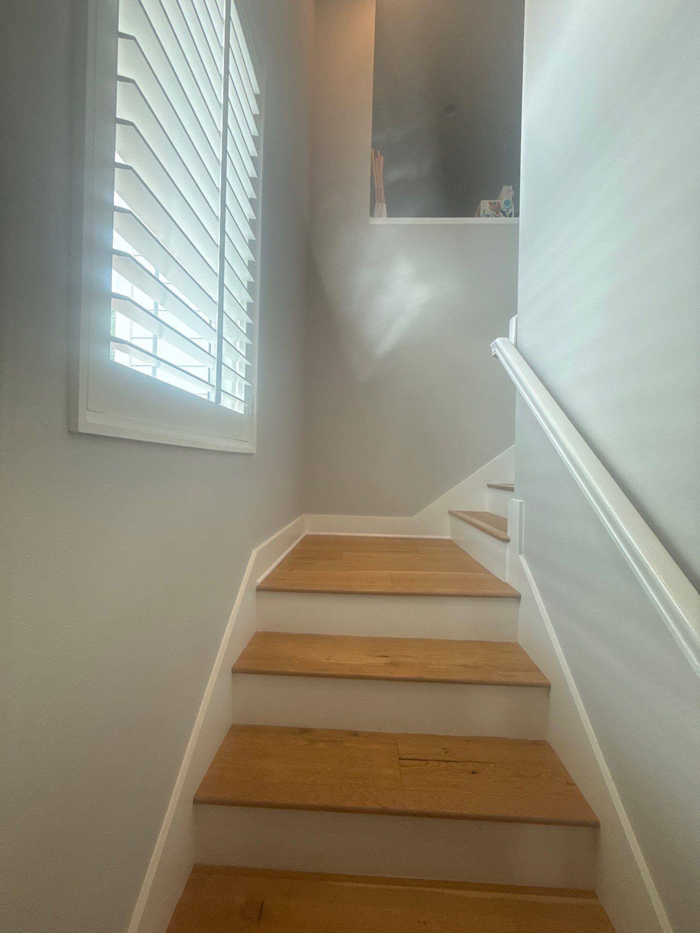 Staircase ahead of interior painting in Austin, TX by Hill Country Painting