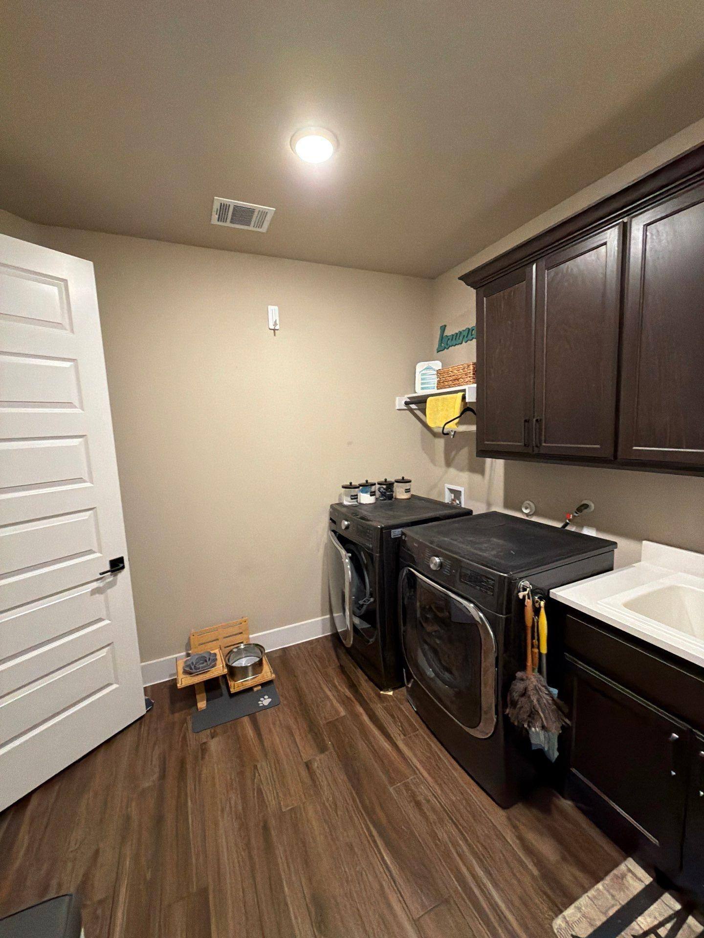 Laundry room of a home in Liberty Hill, TX ahead of interior painting by Hill Country Painting