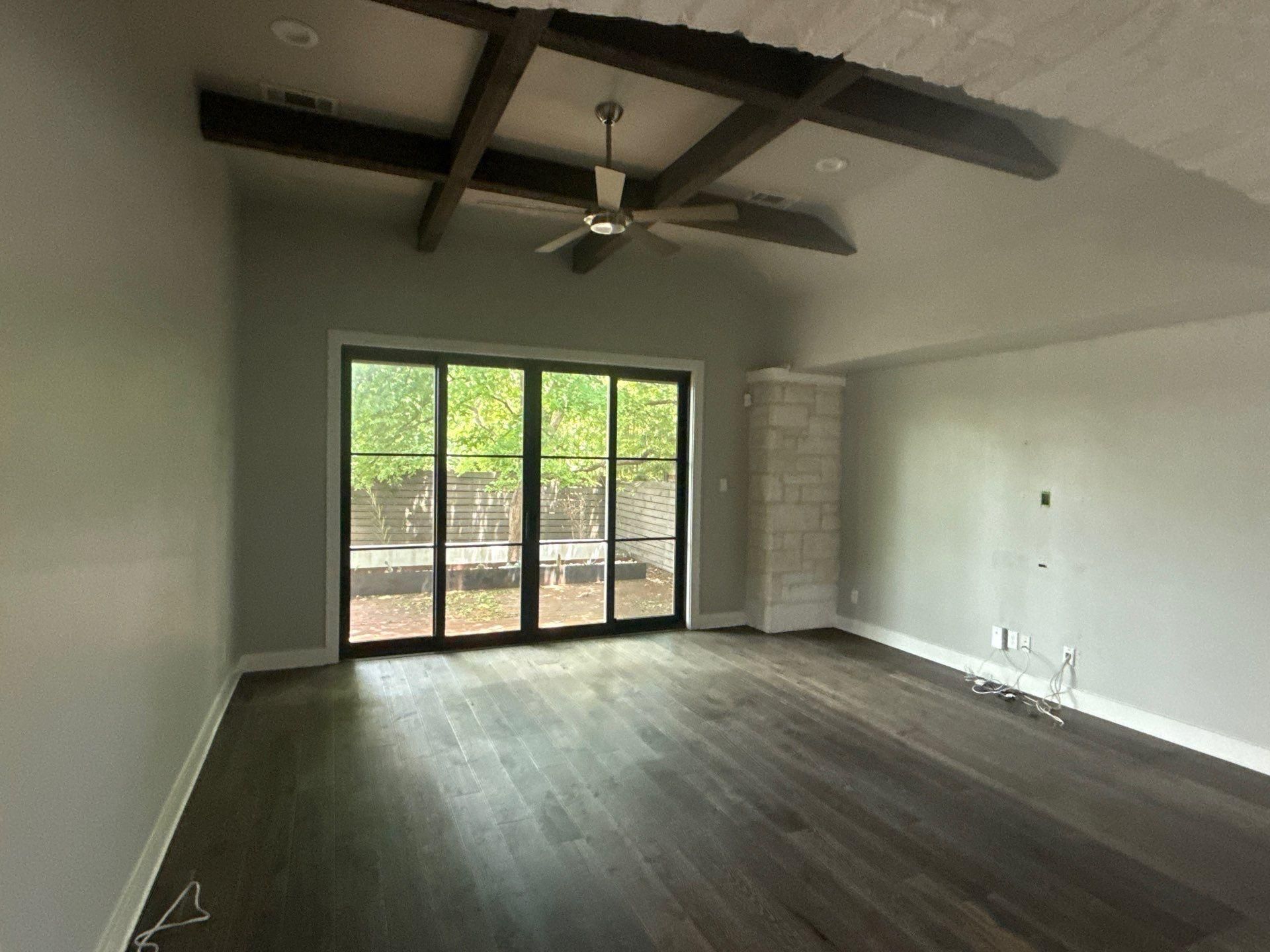 Living room of a home in Austin, TX ahead of interior painting by Hill Country Painting