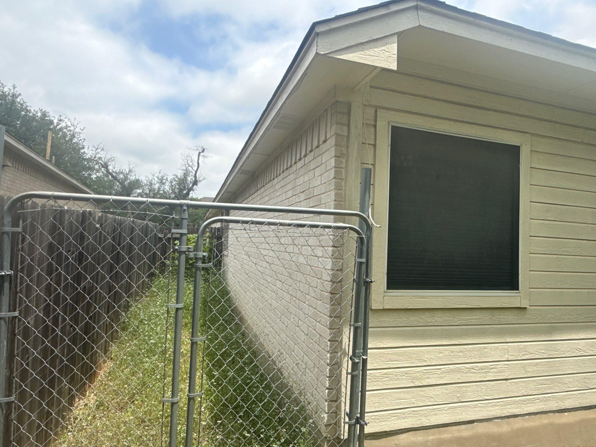 Exterior siding of a home in Austin, TX ahead of exterior painting by Hill Country Painting