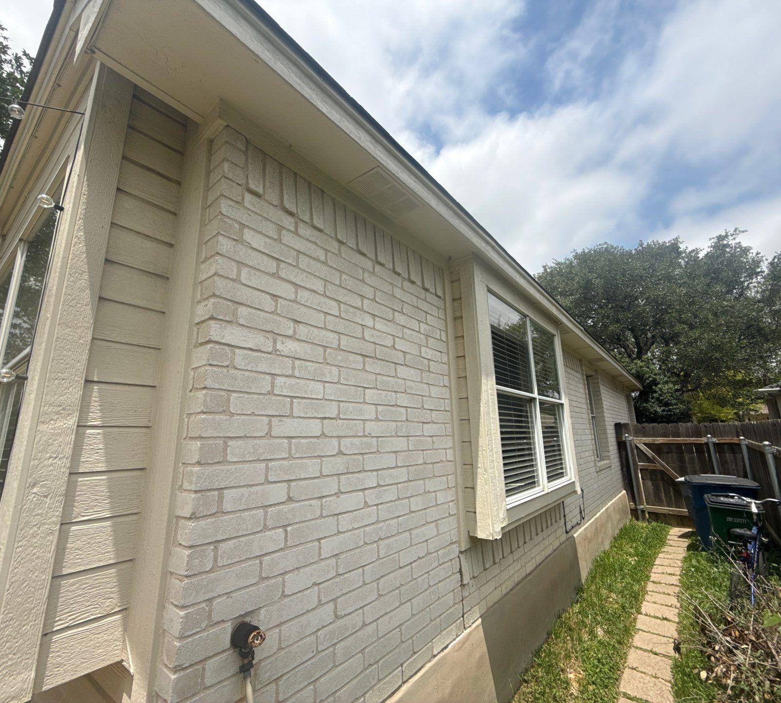 Exterior elevation of a home in Austin, TX ahead of exterior painting by Hill Country Painting