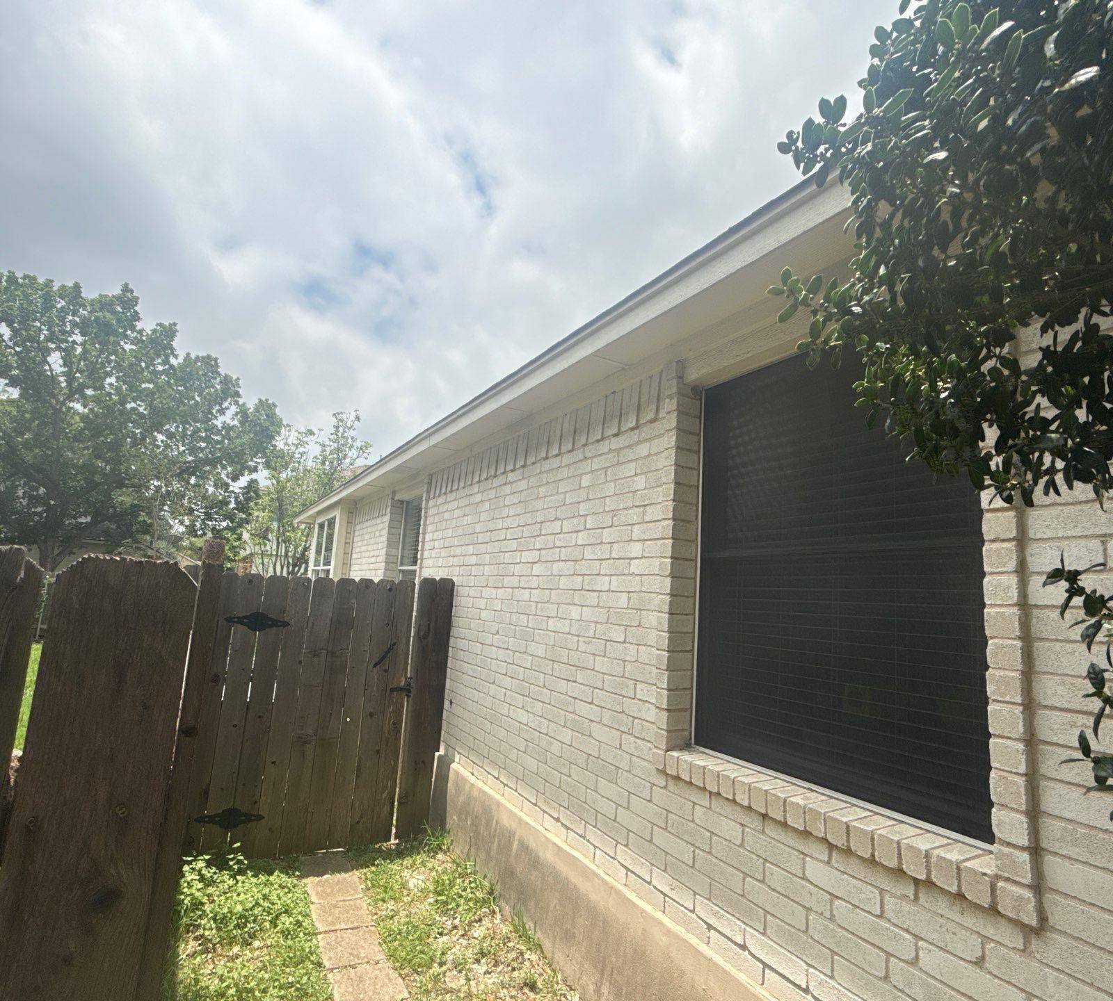 Exterior elevation of a home in Austin, TX ahead of exterior painting by Hill Country Painting