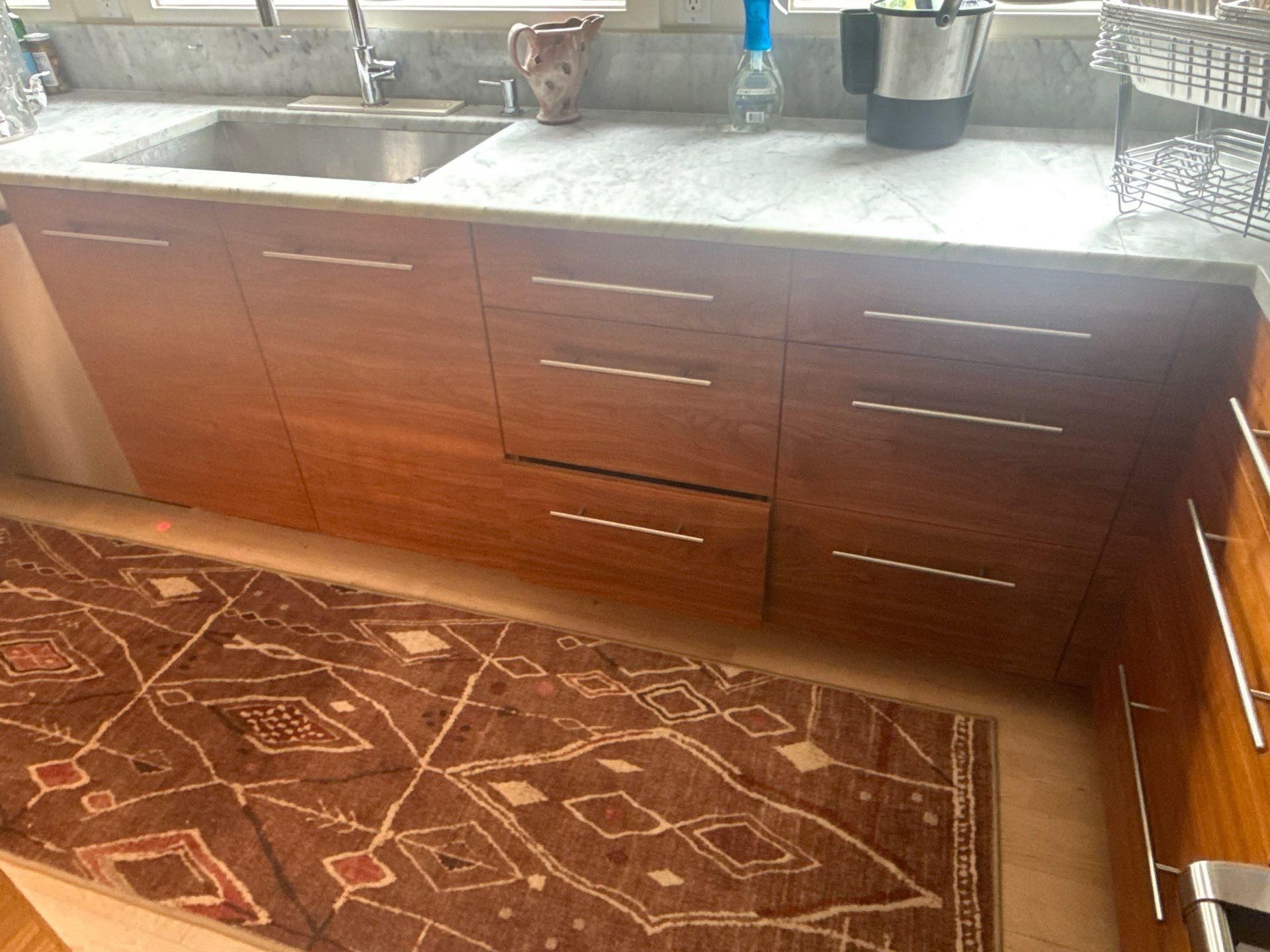 Kitchen cabinet drawers of a home in Austin, TX ahead of cabinet refinishing by Hill Country Painting