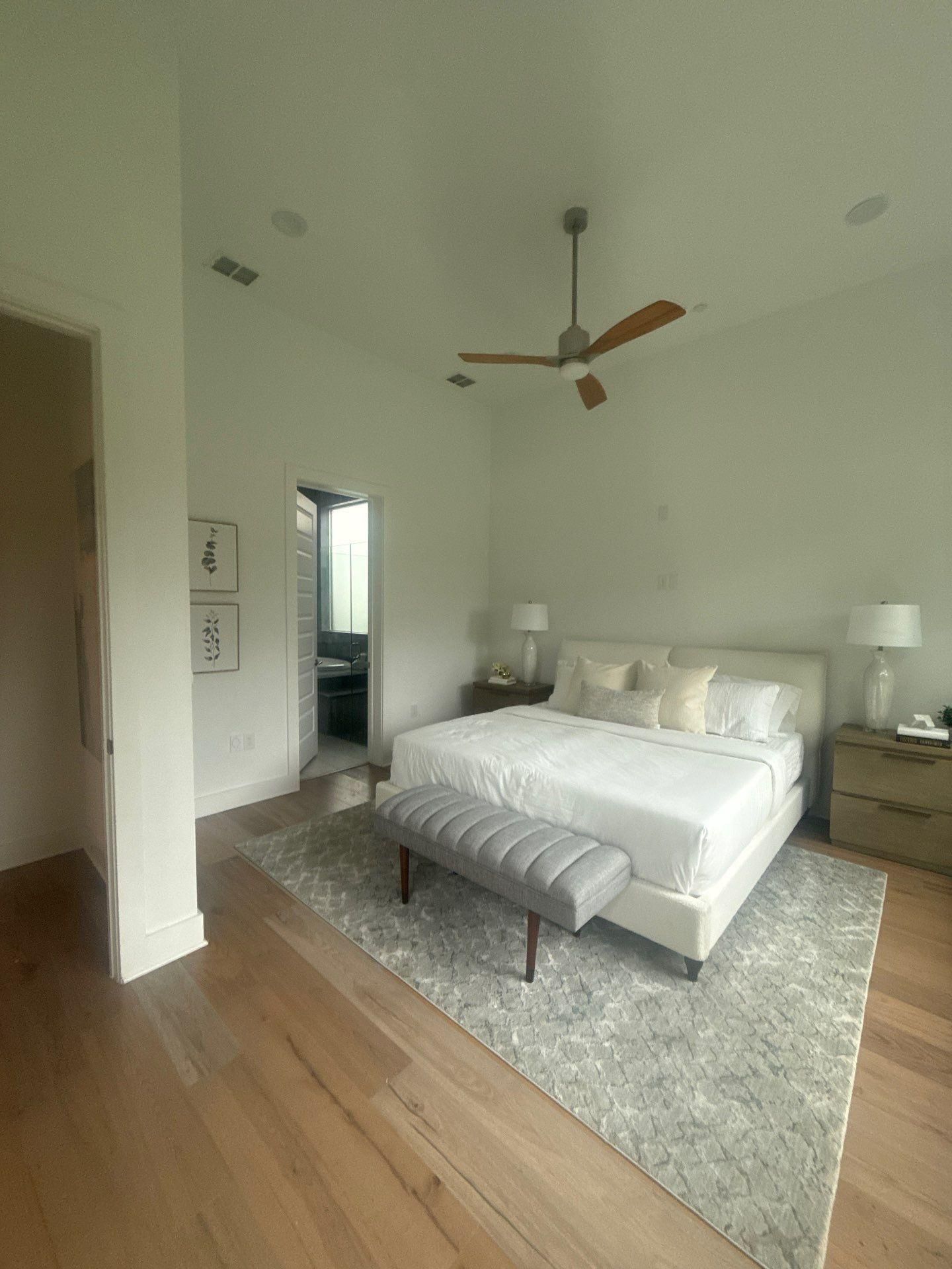 Master bedroom of a home in Austin, TX ahead of interior painting by Hill Country Painting