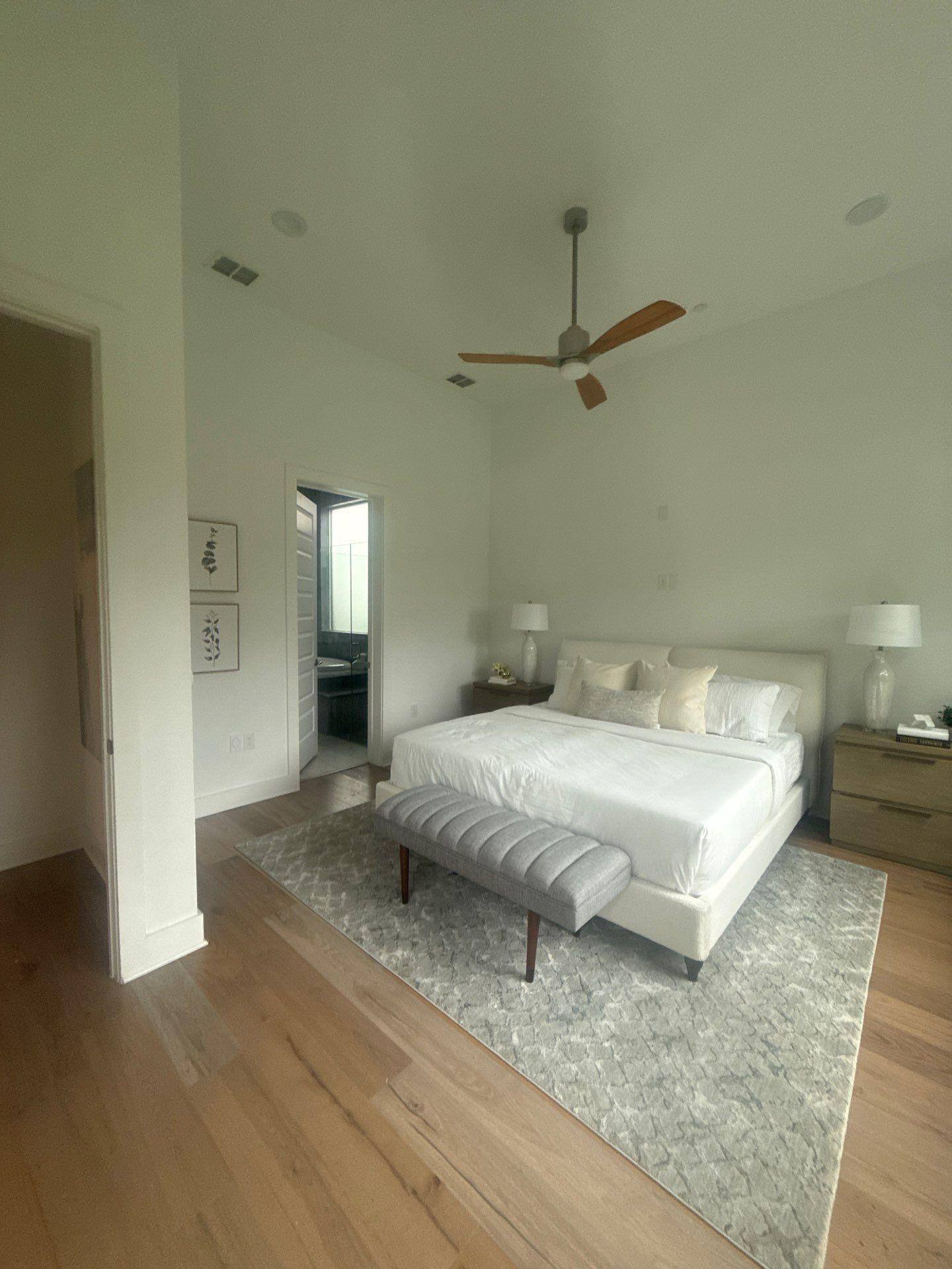 Master bedroom of a home in Austin, TX ahead of interior painting by Hill Country Painting