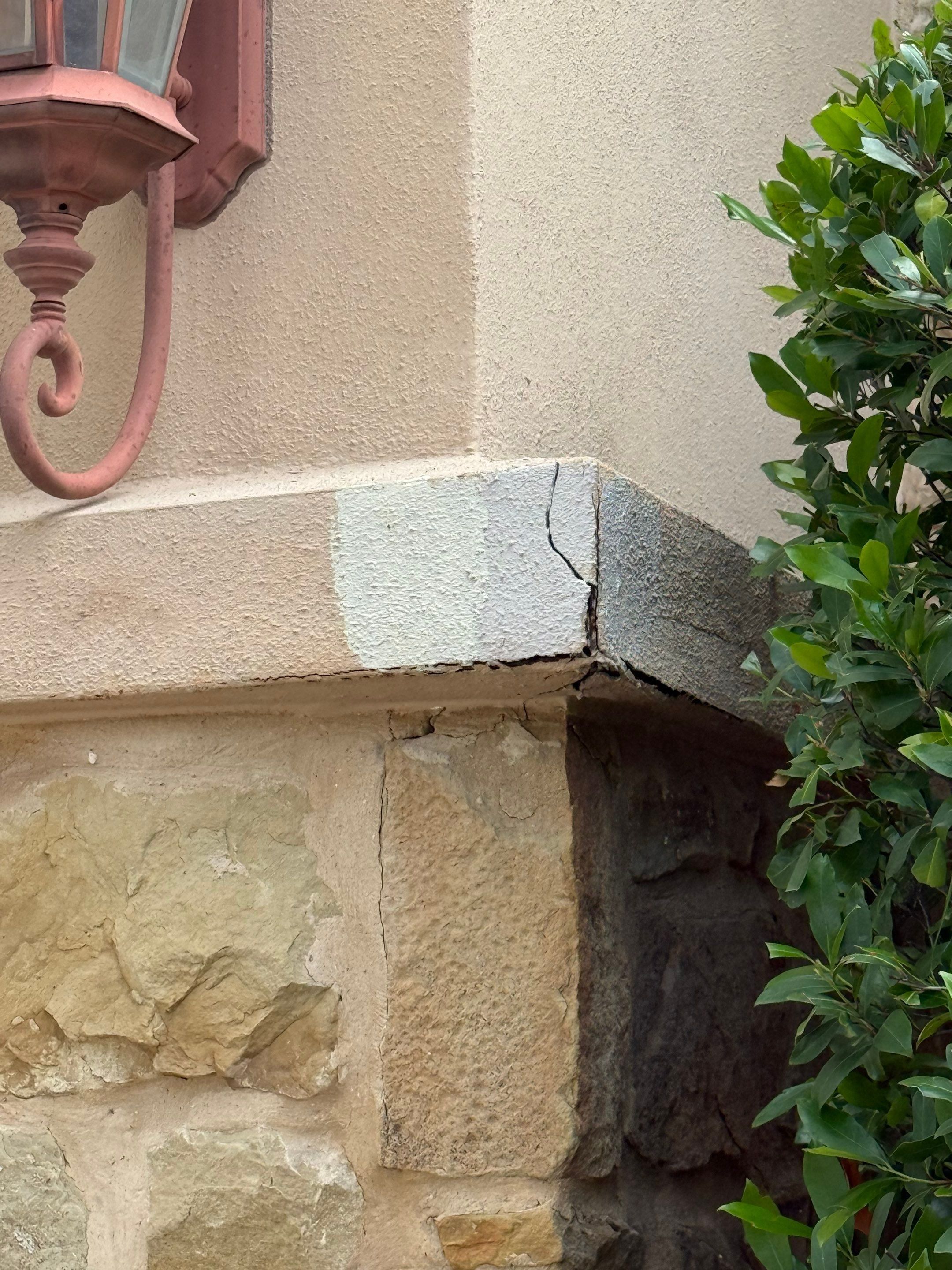 Exterior color test swatches on a stucco column in Austin, TX ahead of exterior painting by Hill Country Painting