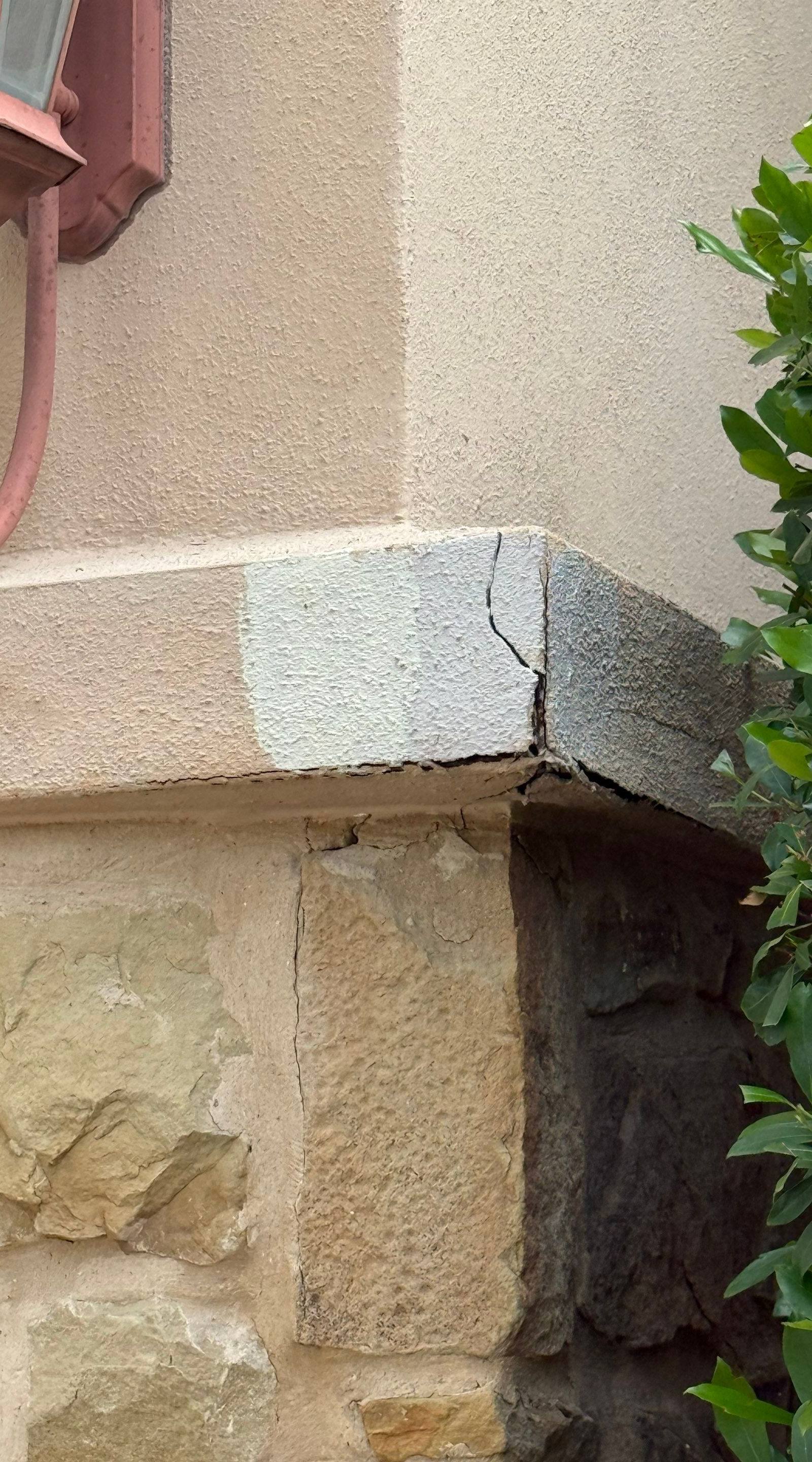 Exterior color test swatches on a stucco column in Austin, TX ahead of exterior painting by Hill Country Painting