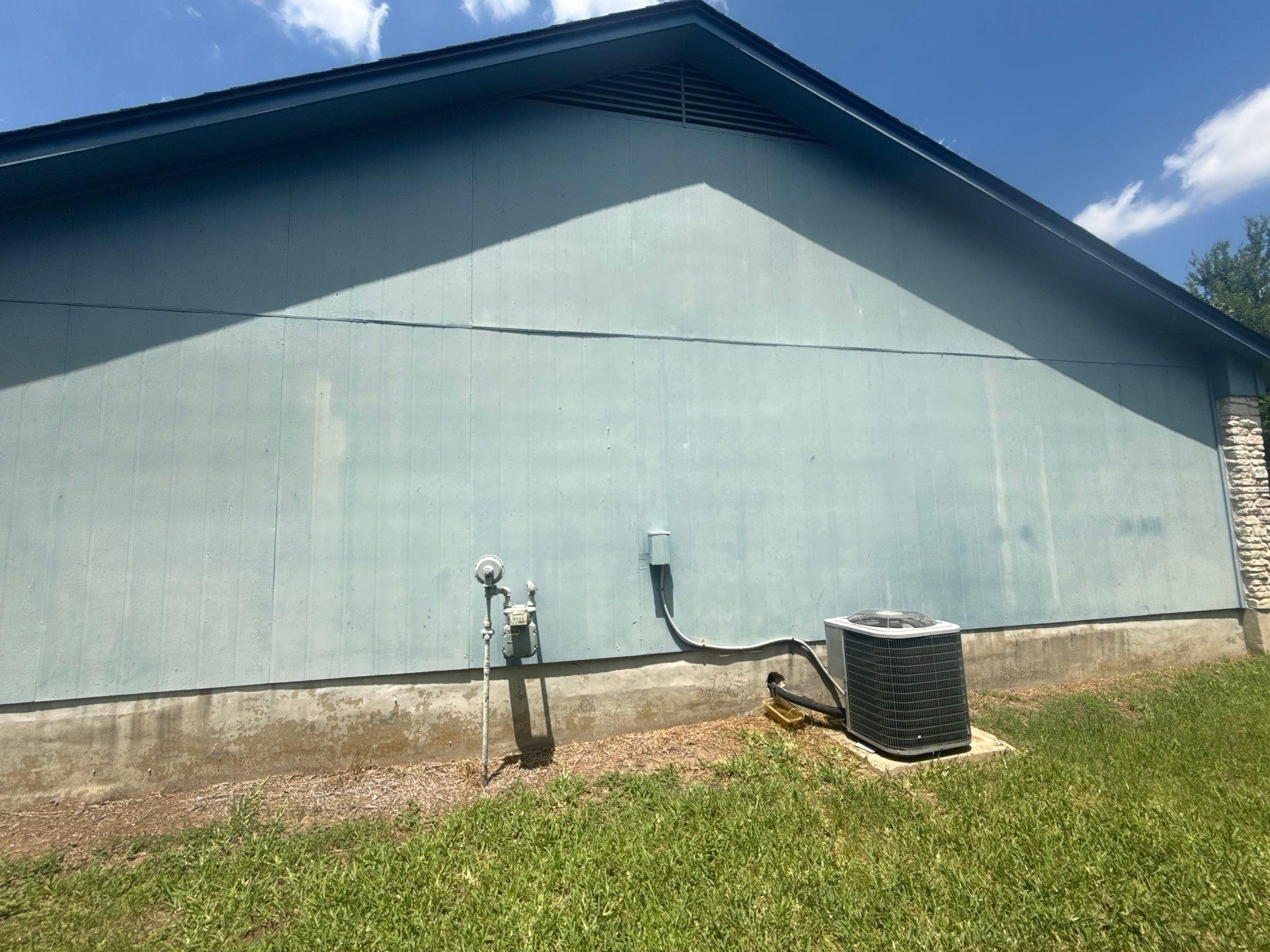 Side exterior siding of a home in Austin, TX showing surface condition ahead of exterior painting by Hill Country Painting