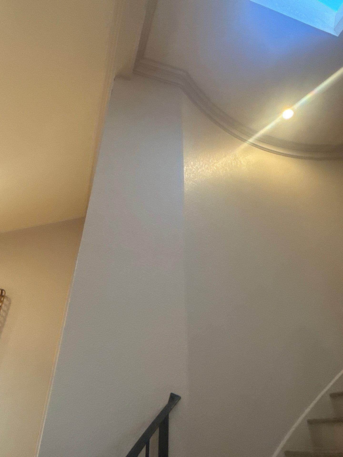 Stairwell ceiling and lighting detail in a home on Challenger in Lakeway, TX ahead of an interior painting estimate by Hill Country Painting