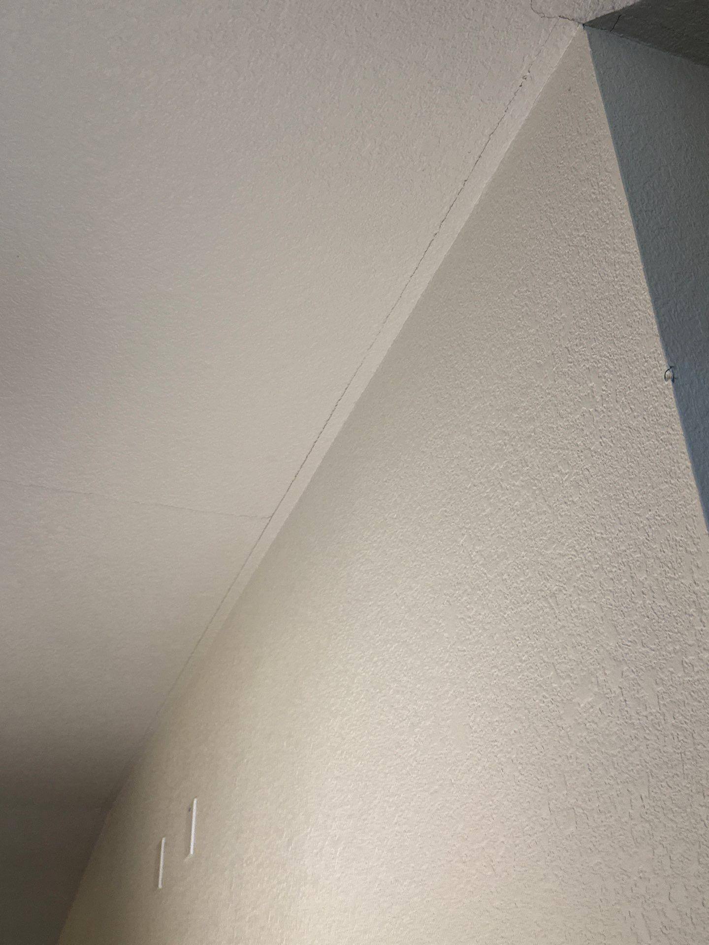 Ceiling crack detail ahead of drywall repair and interior painting by Hill Country Painting in Round Rock, TX
