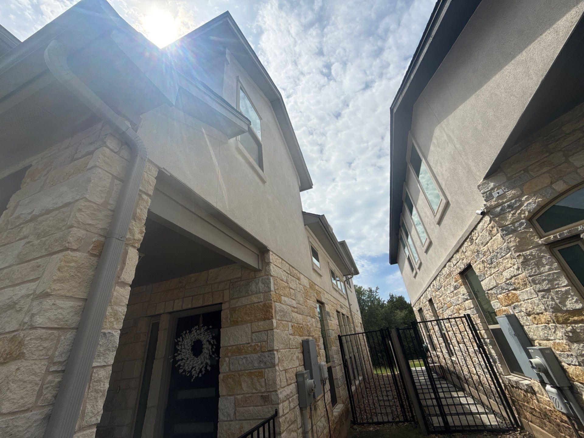Front entrance of a townhome on Westinghouse in Round Rock, TX ahead of interior and exterior painting by Hill Country Painting