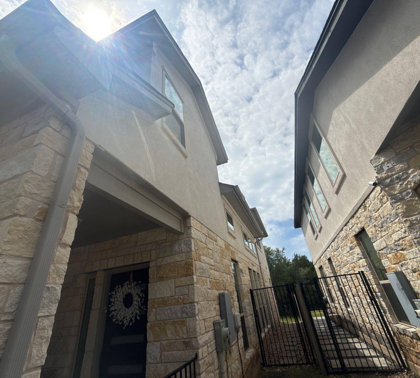 Front entrance of a townhome on Westinghouse in Round Rock, TX ahead of interior and exterior painting by Hill Country Painting
