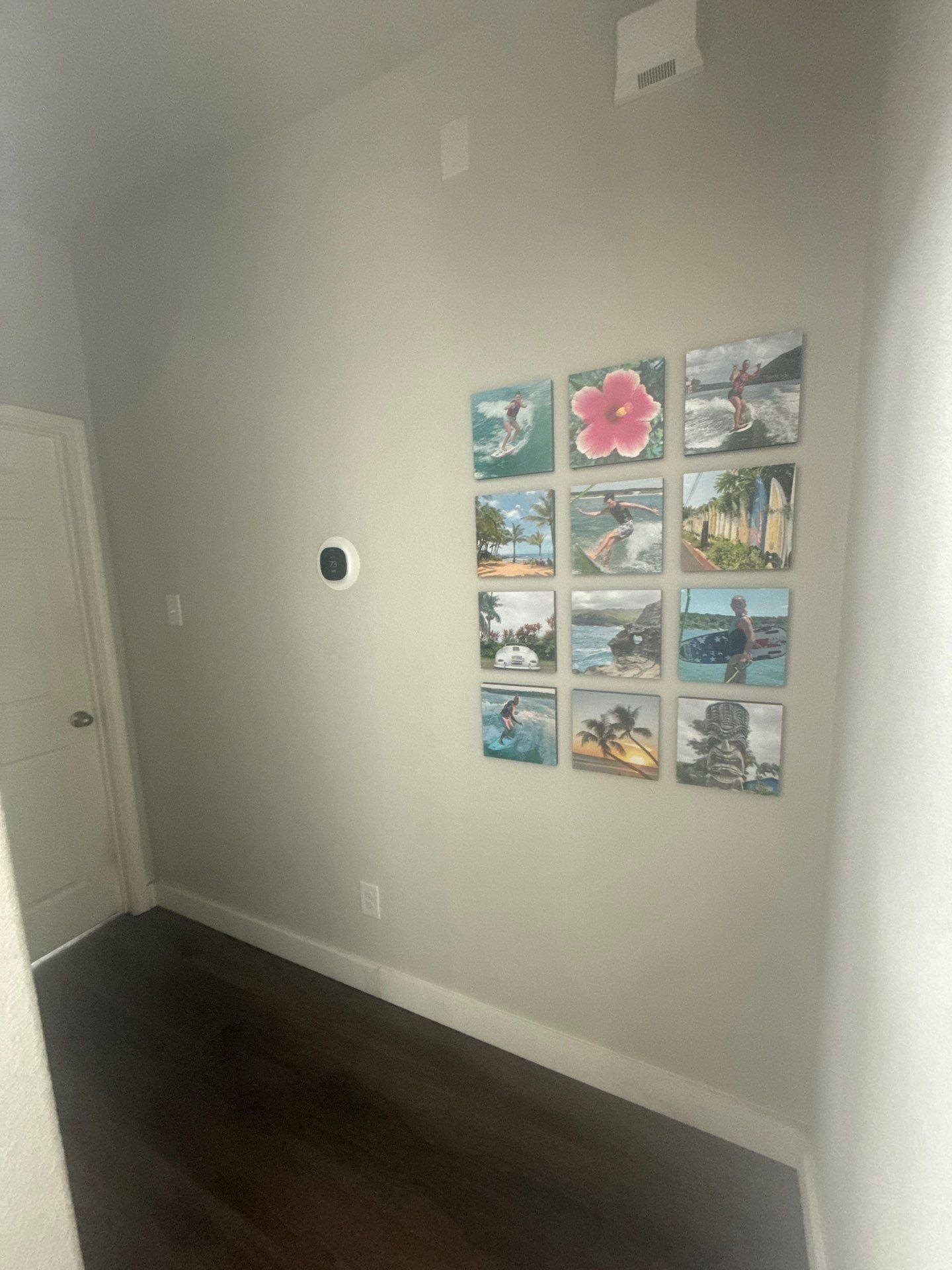 Stairwell wall in a home on Kite Wing Ter in Pflugerville, TX prepared for painting by Hill Country Painting