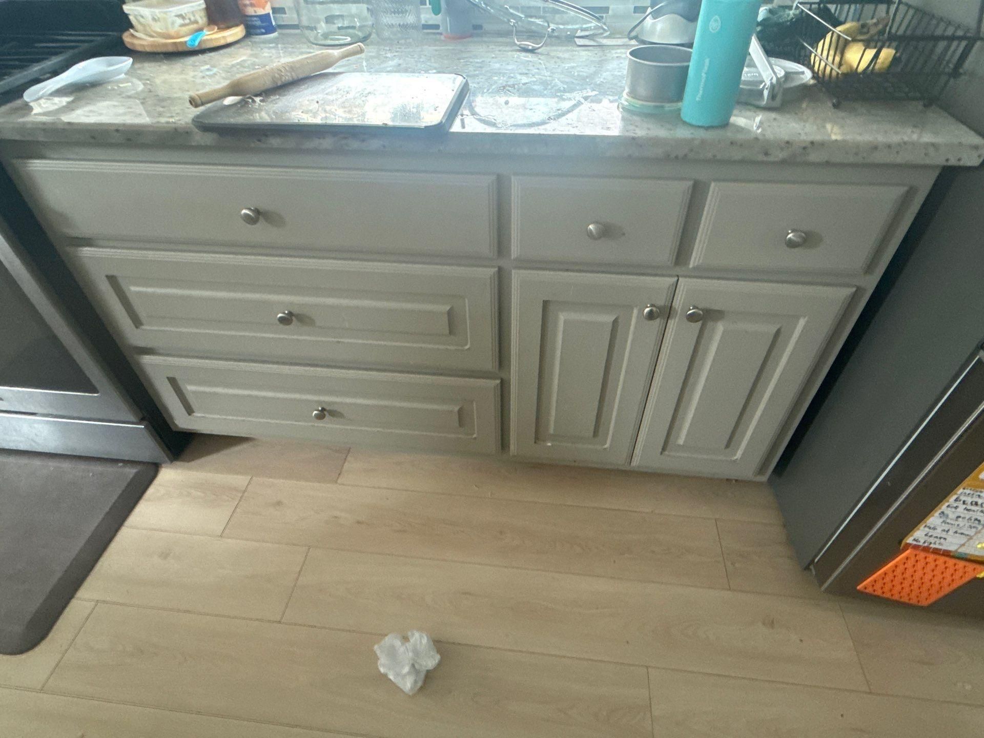 Kitchen cabinet drawers and doors in a home on Tuberose Terrace in Austin, TX refinished by Hill Country Painting