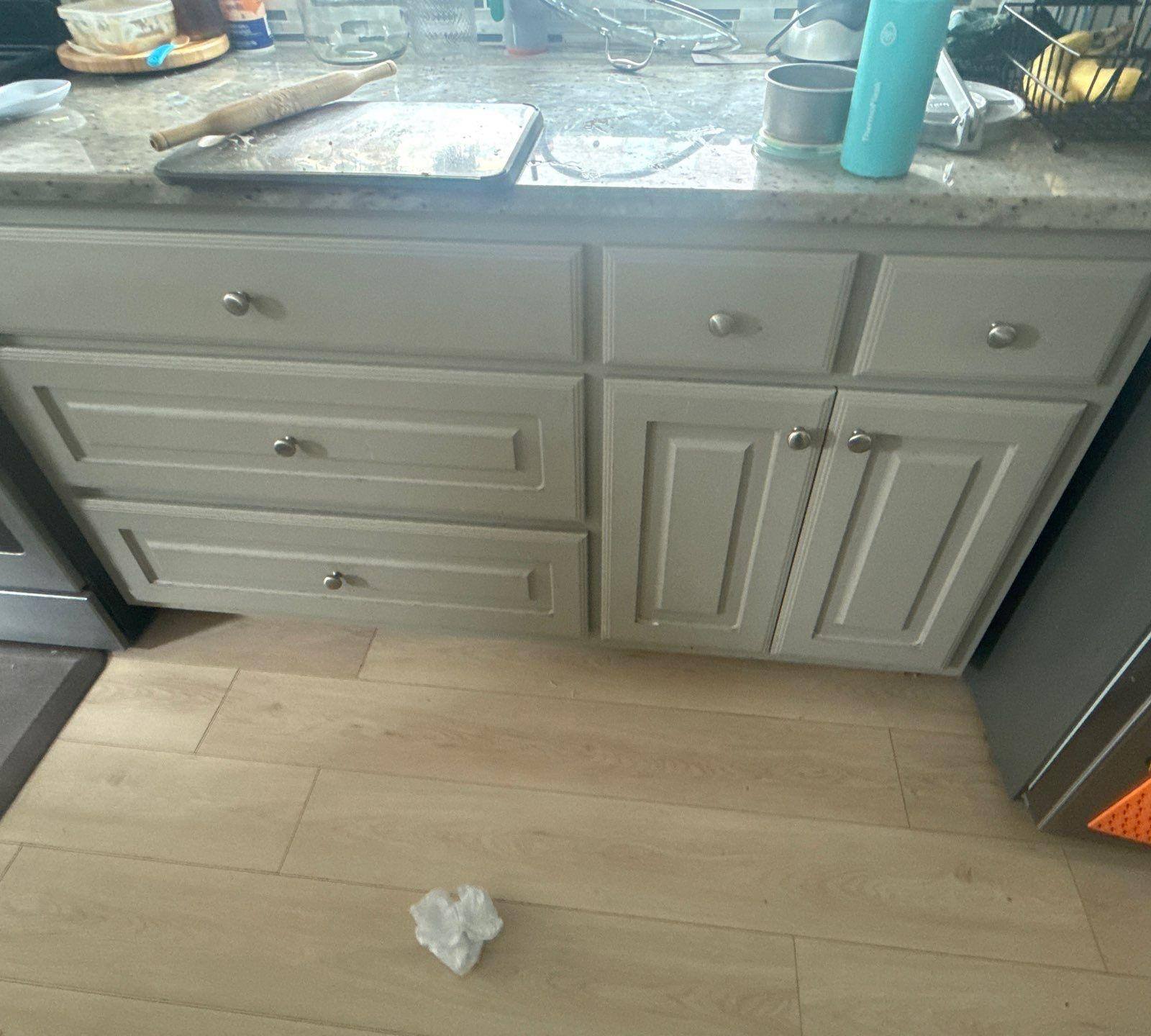 Kitchen cabinet drawers and doors in a home on Tuberose Terrace in Austin, TX refinished by Hill Country Painting