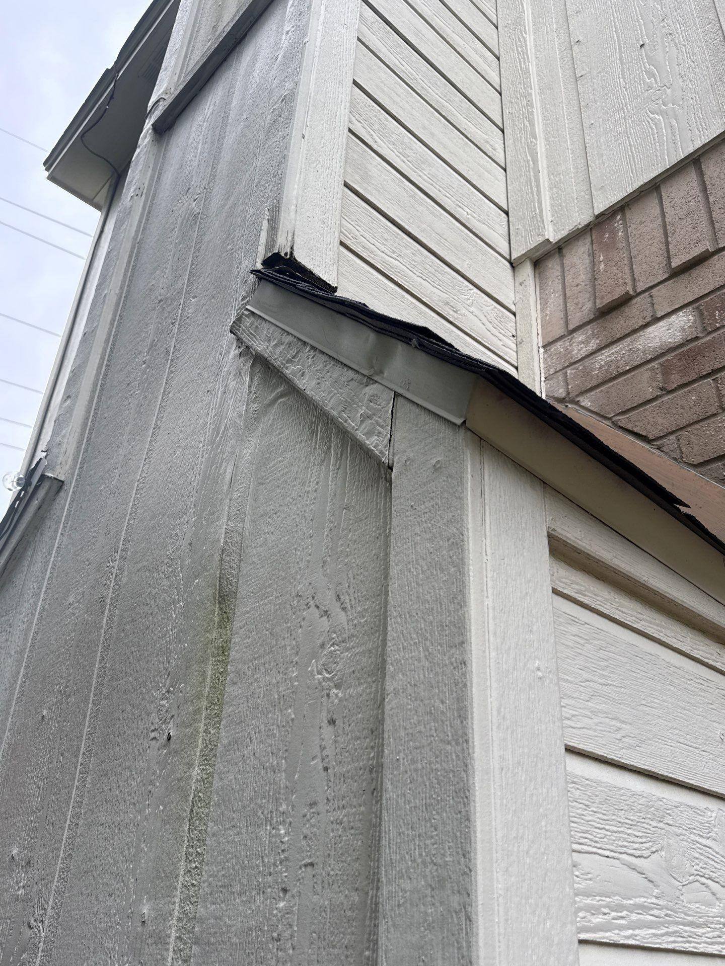 Siding and soffit detail on a home on Portland Trail in Austin, TX prepared for a painting estimate by Hill Country Painting