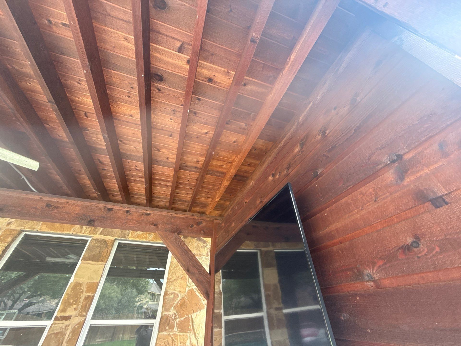 Pergola wood ceiling detail at a home on Avery Woods Ln in Cedar Park, TX prepared for a painting estimate by Hill Country Painting