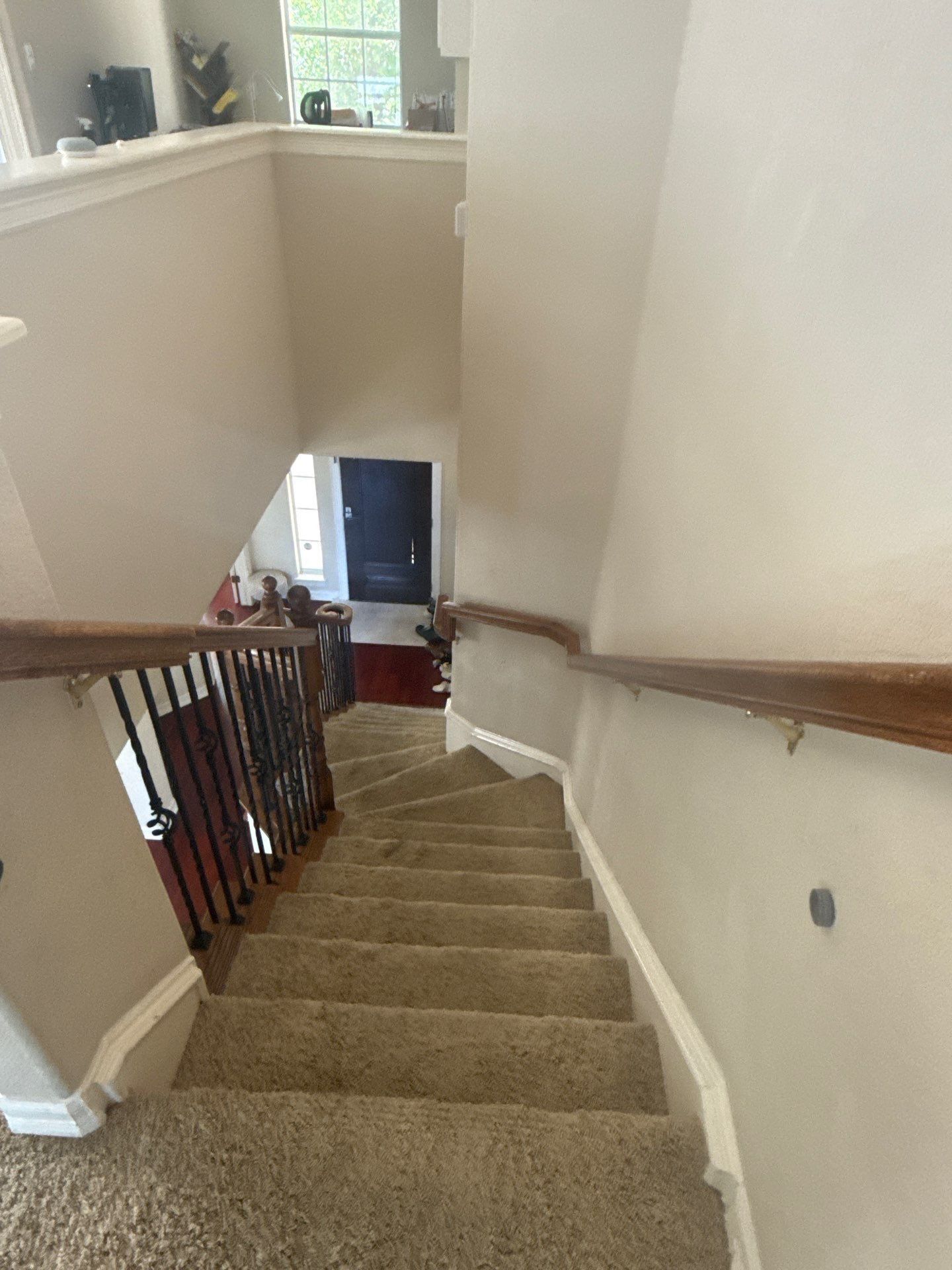 Stairwell in a home on Spicewood Pkwy in Austin, TX prepared for an interior painting estimate by Hill Country Painting