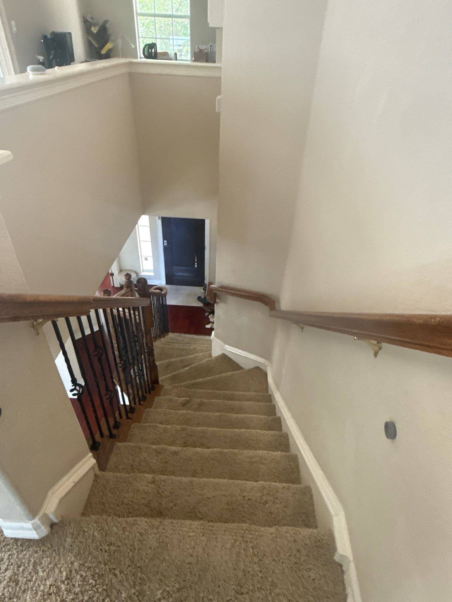 Stairwell in a home on Spicewood Pkwy in Austin, TX prepared for an interior painting estimate by Hill Country Painting