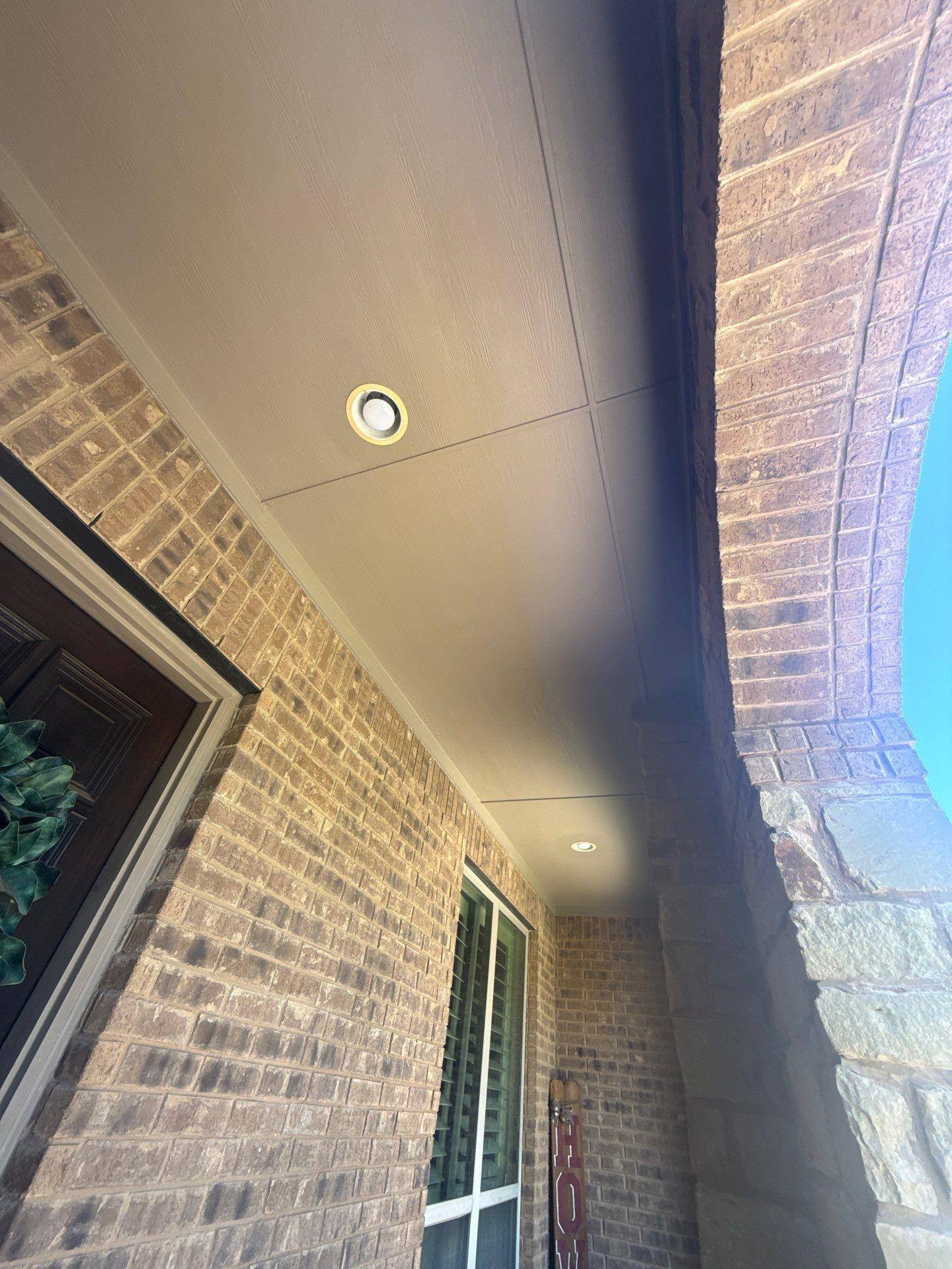 Covered porch ceiling detail at a home on Flycatcher Ct in Austin, TX prepared for an exterior painting estimate by Hill Country Painting