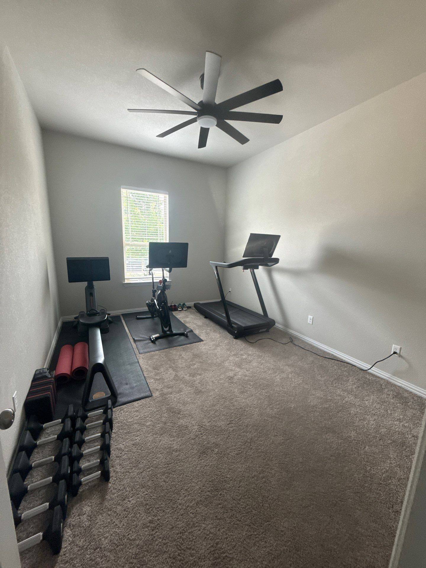 Home gym room of a home on Twisted Root Dr in Manchaca, TX prepared for an interior painting estimate by Hill Country Painting