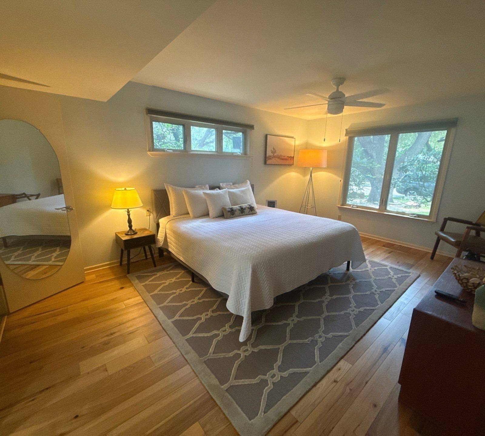 Master bedroom of a home on Lexington Rd in Austin, TX prepared for an interior painting estimate by Hill Country Painting