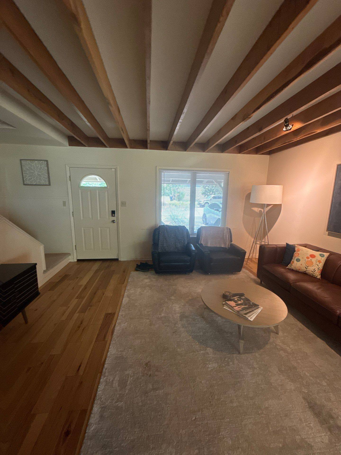 Living room of a home on Lexington Rd in Austin, TX prepared for an interior painting estimate by Hill Country Painting