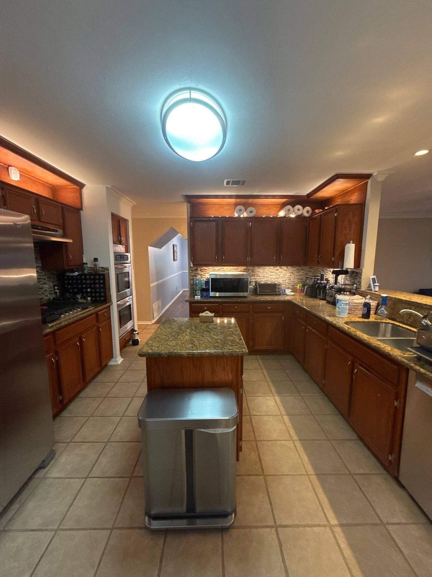 Kitchen of a home on Napier Trail in Austin, TX prepared for an interior painting estimate by Hill Country Painting