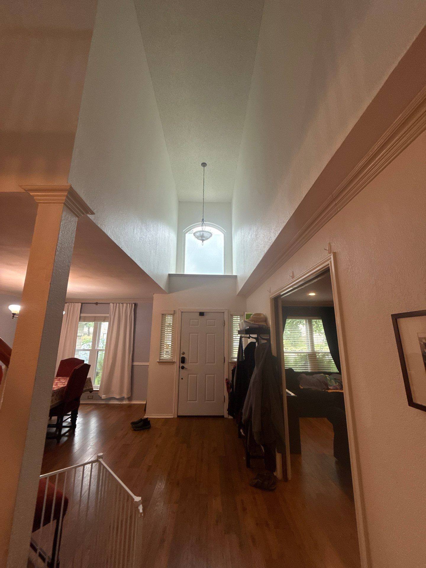Entryway of a home on Napier Trail in Austin, TX prepared for an interior painting estimate by Hill Country Painting