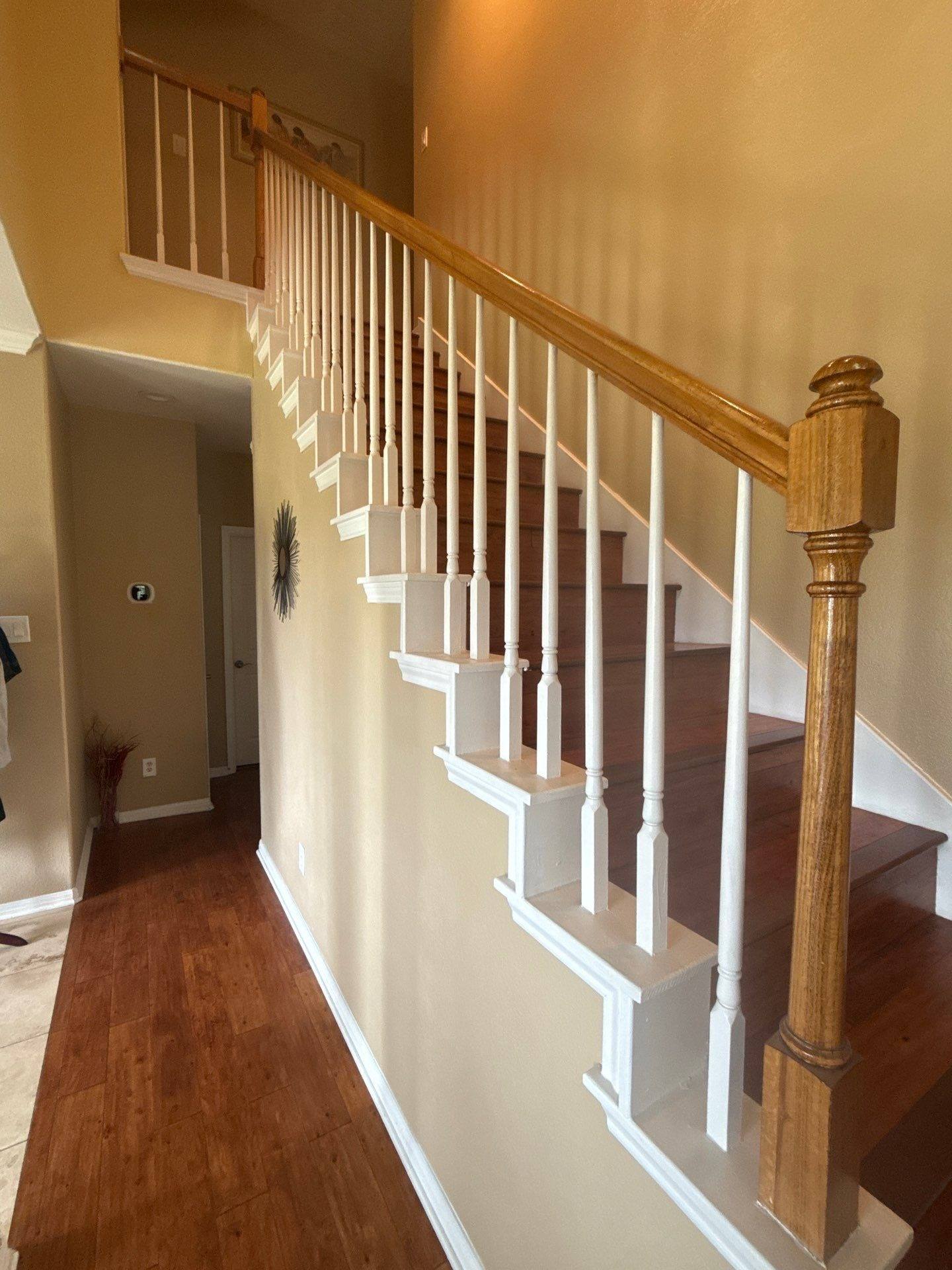 Staircase of a home on Springlake Dr in Dripping Springs, TX prepared for an interior painting estimate by Hill Country Painting