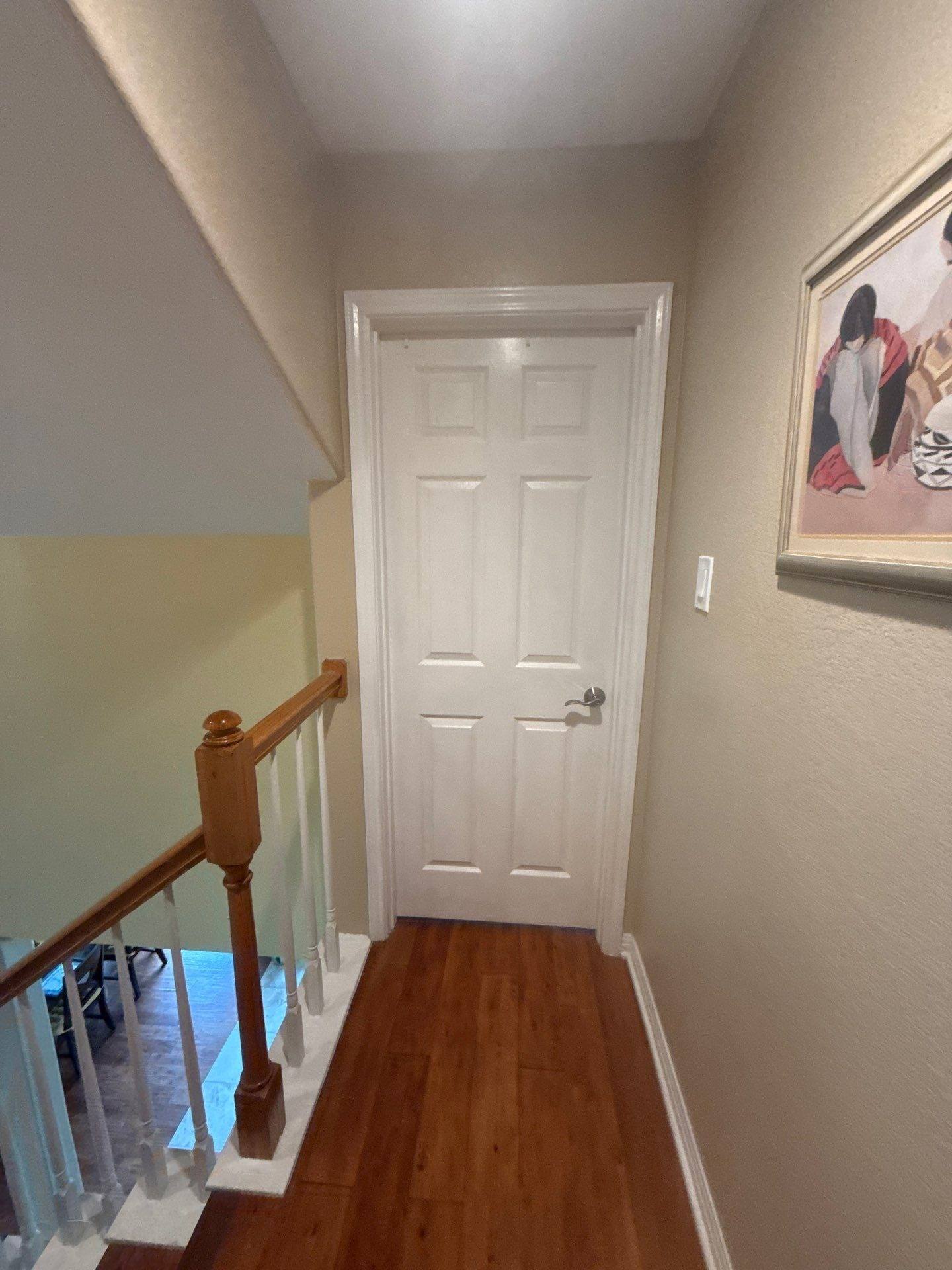 Upstairs hallway of a home on Springlake Dr in Dripping Springs, TX prepared for an interior painting estimate by Hill Country Painting
