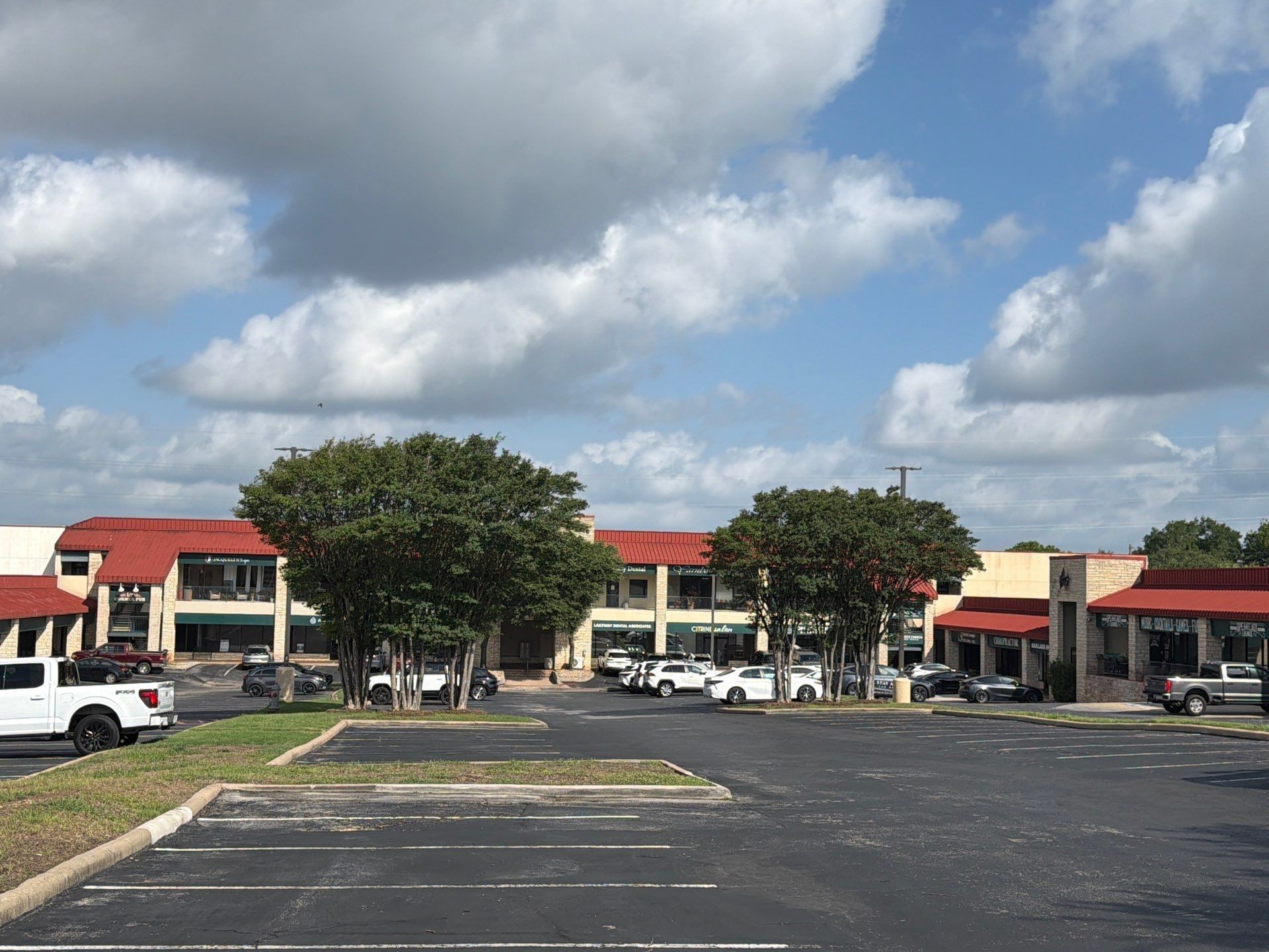 Retail plaza exterior on Ranch Rd 620 S in Lakeway, TX prepared for an exterior painting estimate by Hill Country Painting
