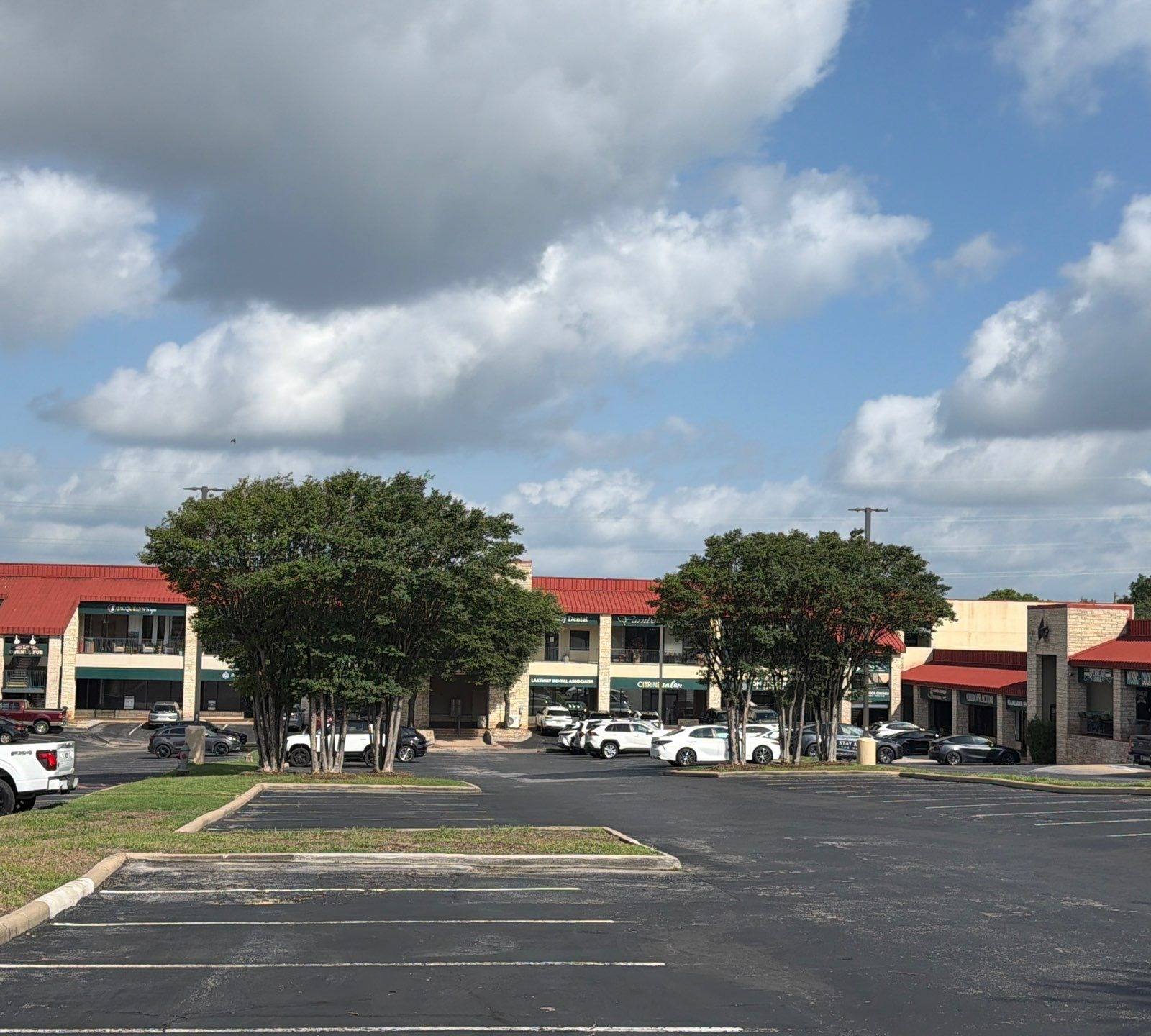 Retail plaza exterior on Ranch Rd 620 S in Lakeway, TX prepared for an exterior painting estimate by Hill Country Painting