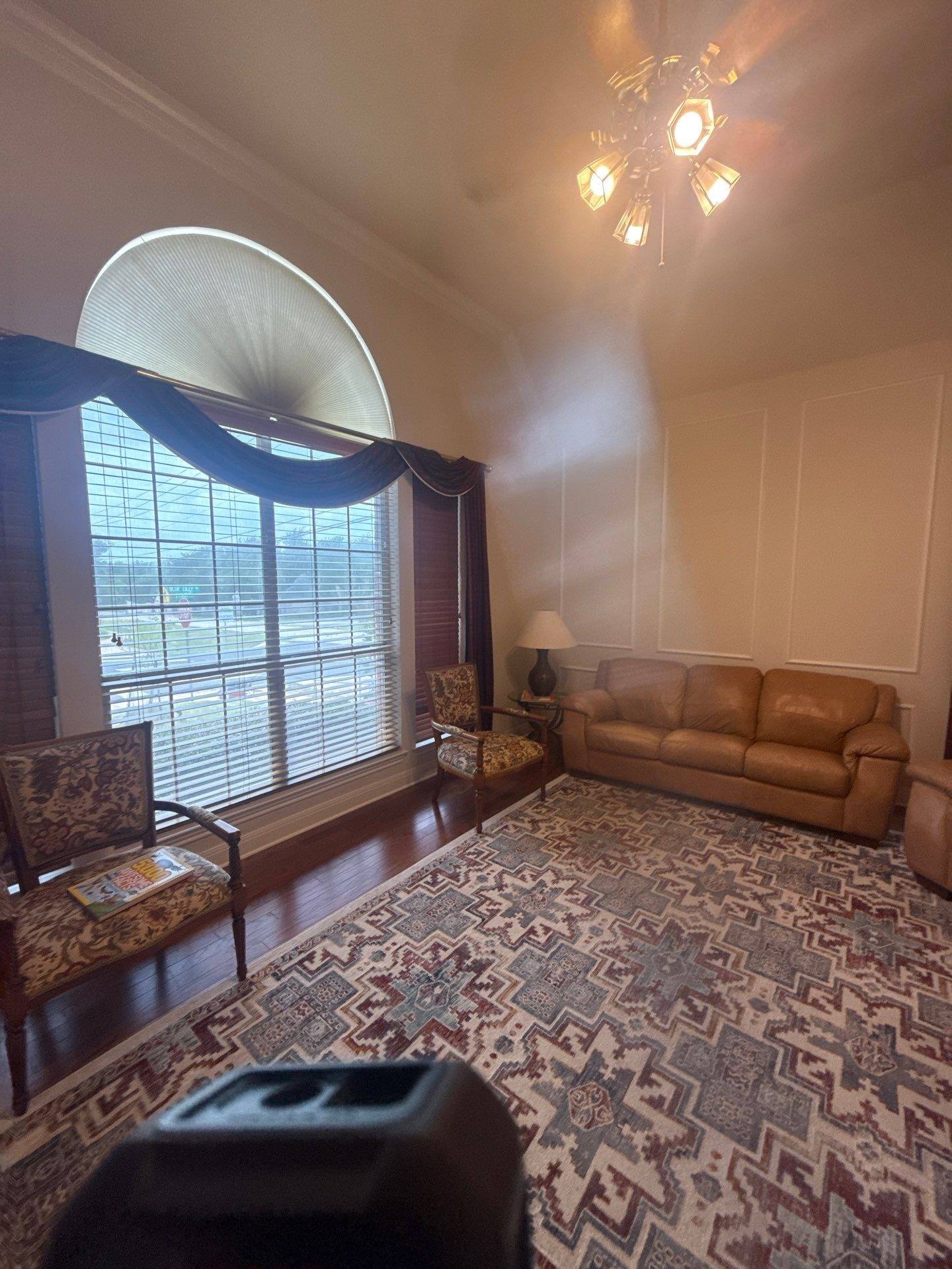 Sitting area of a home on Blue Lilly Dr in Austin, TX ahead of interior painting by Hill Country Painting